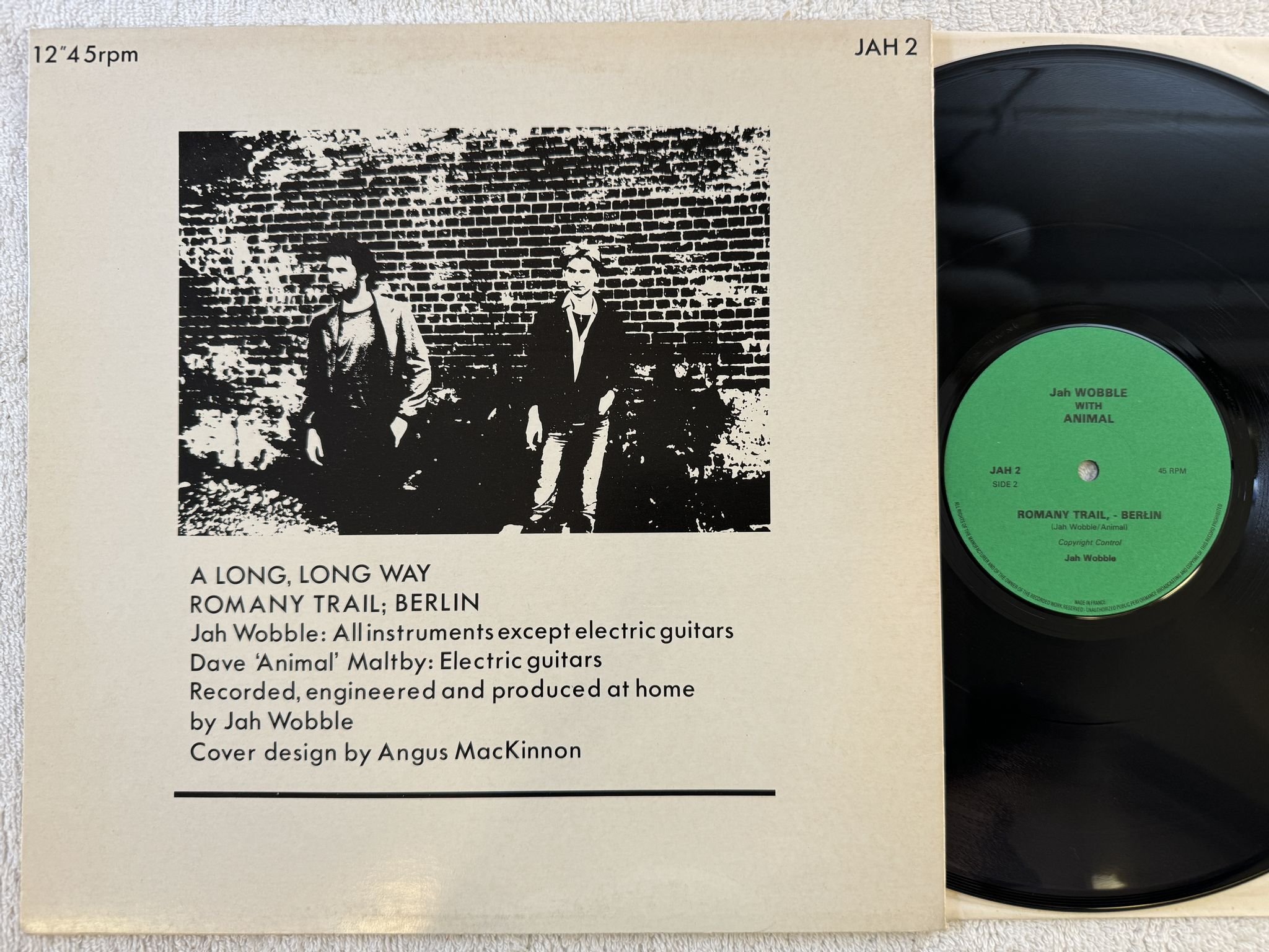 Omslagsbild för skivan Jah Wobble With Animal - A Long, Long Way 12" -82 UK LAGO JAH 2