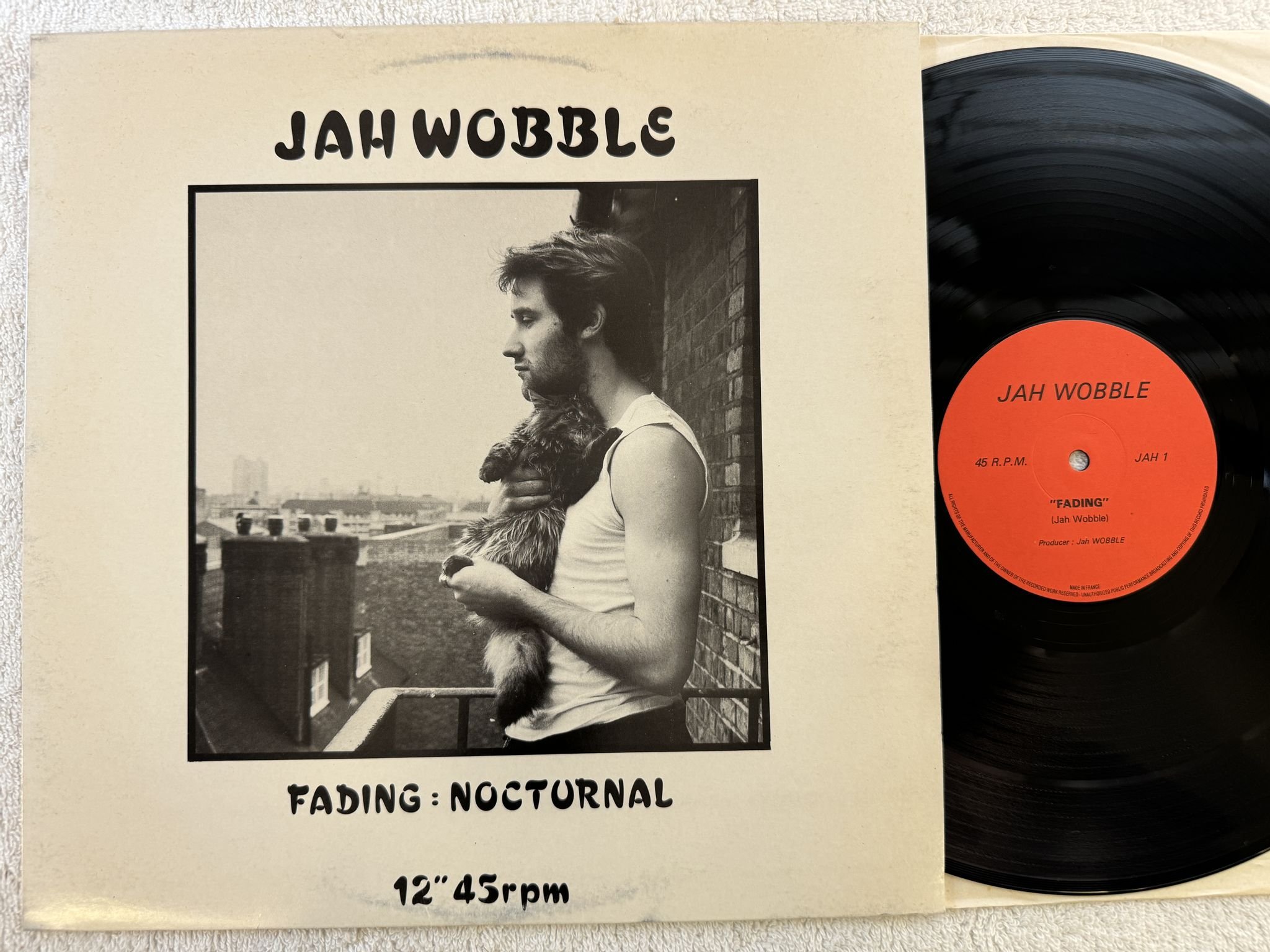Omslagsbild för skivan Jah Wobble – Fading : Nocturnal 12" -81 UK LAGO JAH 1