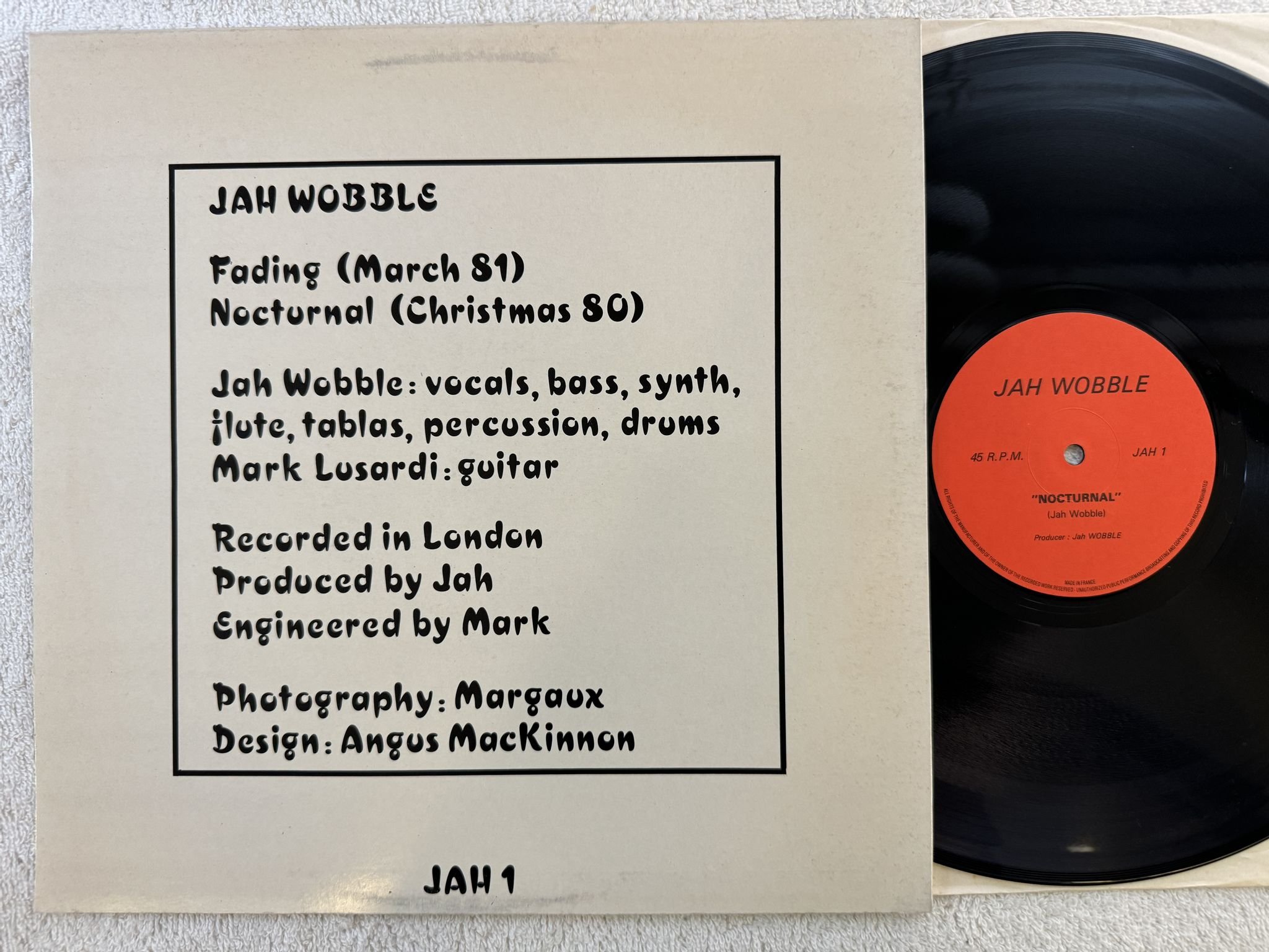 Omslagsbild för skivan Jah Wobble – Fading : Nocturnal 12" -81 UK LAGO JAH 1