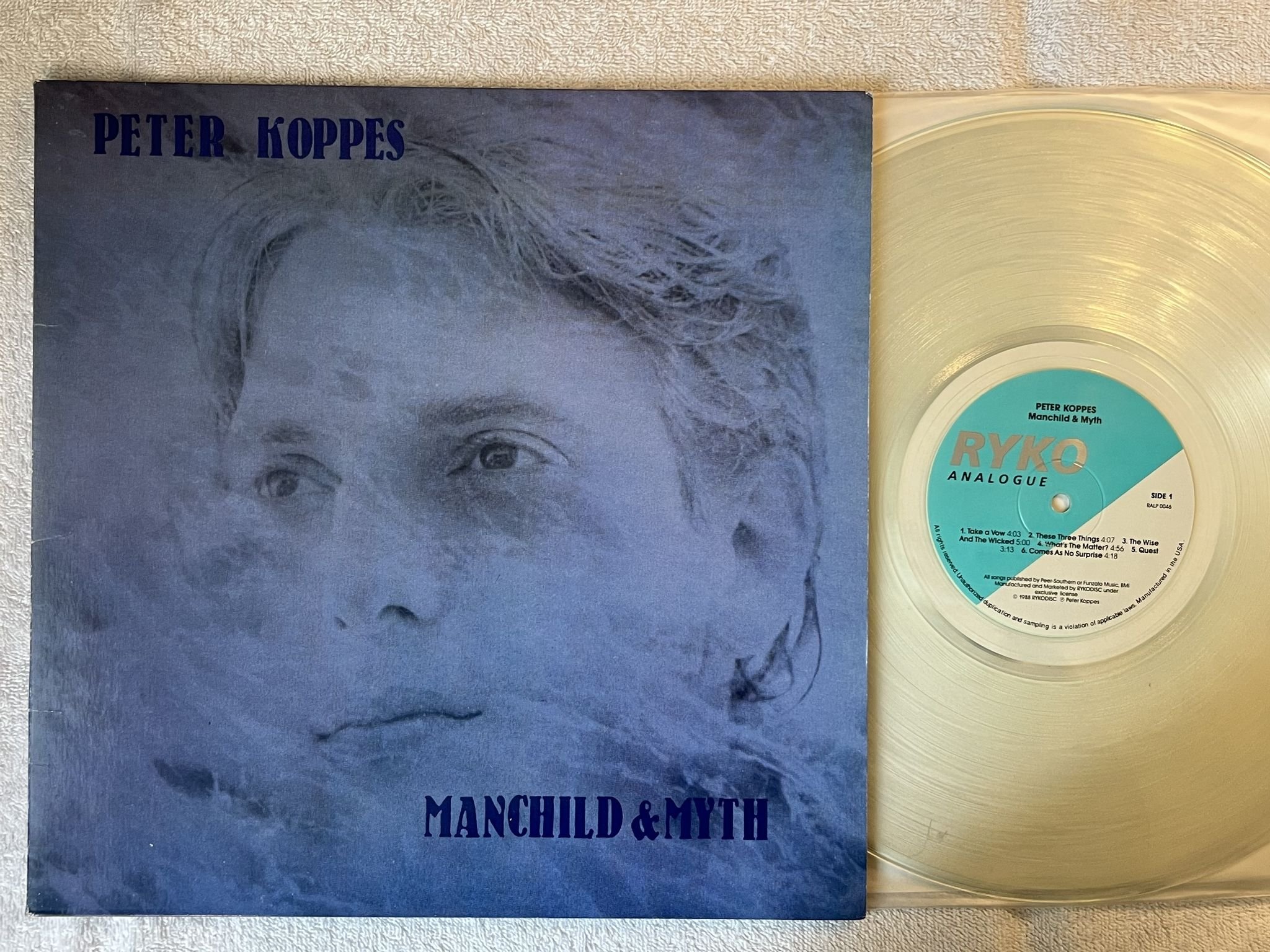 Omslagsbild för skivan PETER KOPPES Manchild & Myth LP -88 US RYKO ANALOGUE RALP 0046