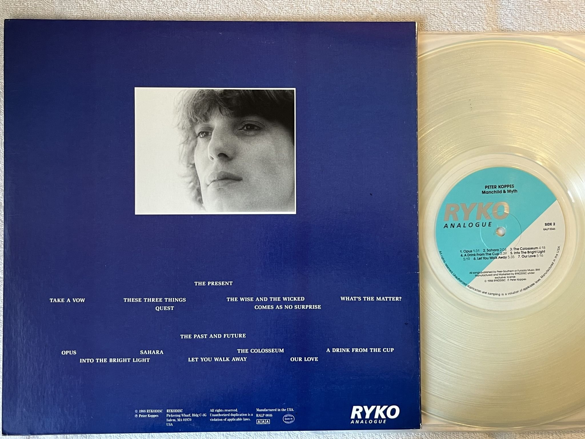 Omslagsbild för skivan PETER KOPPES Manchild & Myth LP -88 US RYKO ANALOGUE RALP 0046