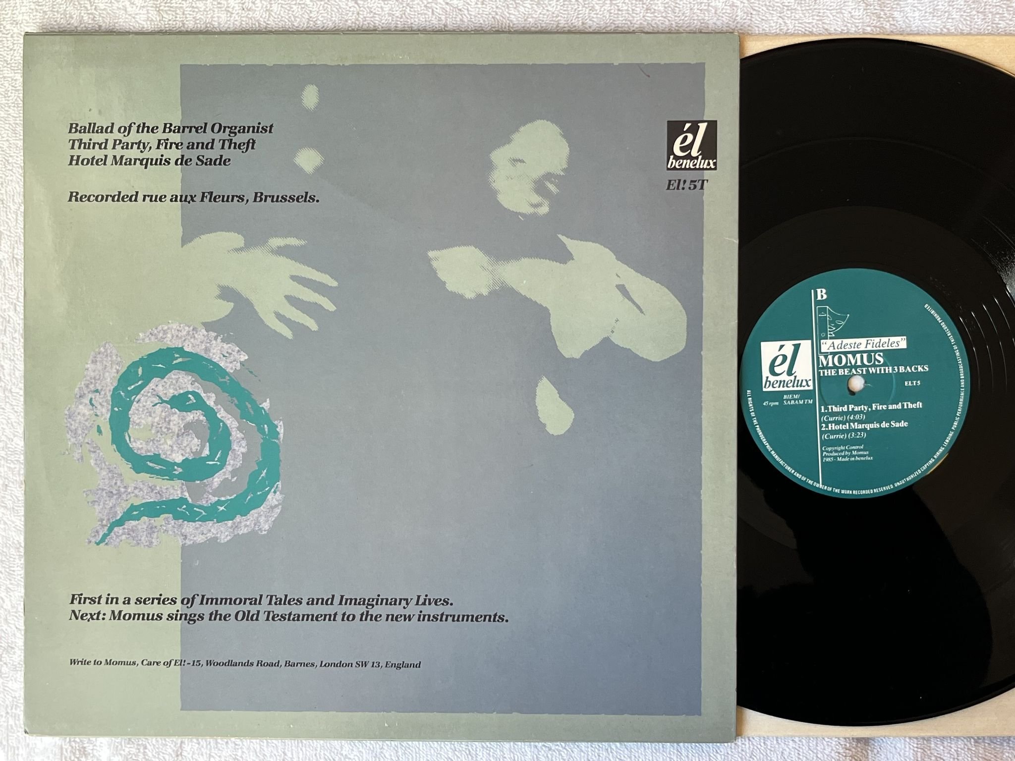 Omslagsbild för skivan MOMUS The Beast With 3 Backs 12" -85 Belgium ÉL BENELUX ELT 5