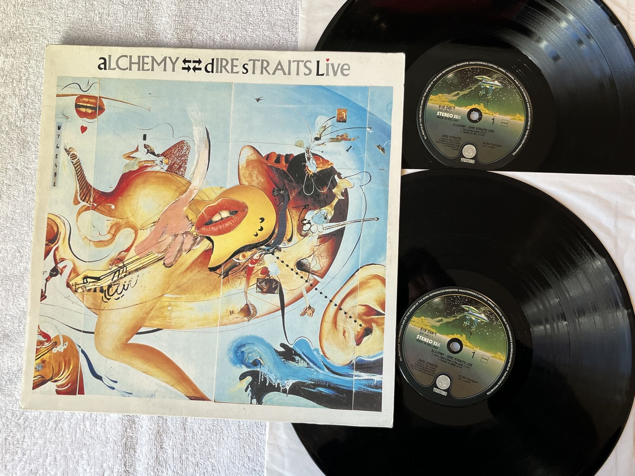 Omslagsbild för skivan DIRE STRAITS alchemy - live 2xLP -84 Hol VERTIGO 818244-1