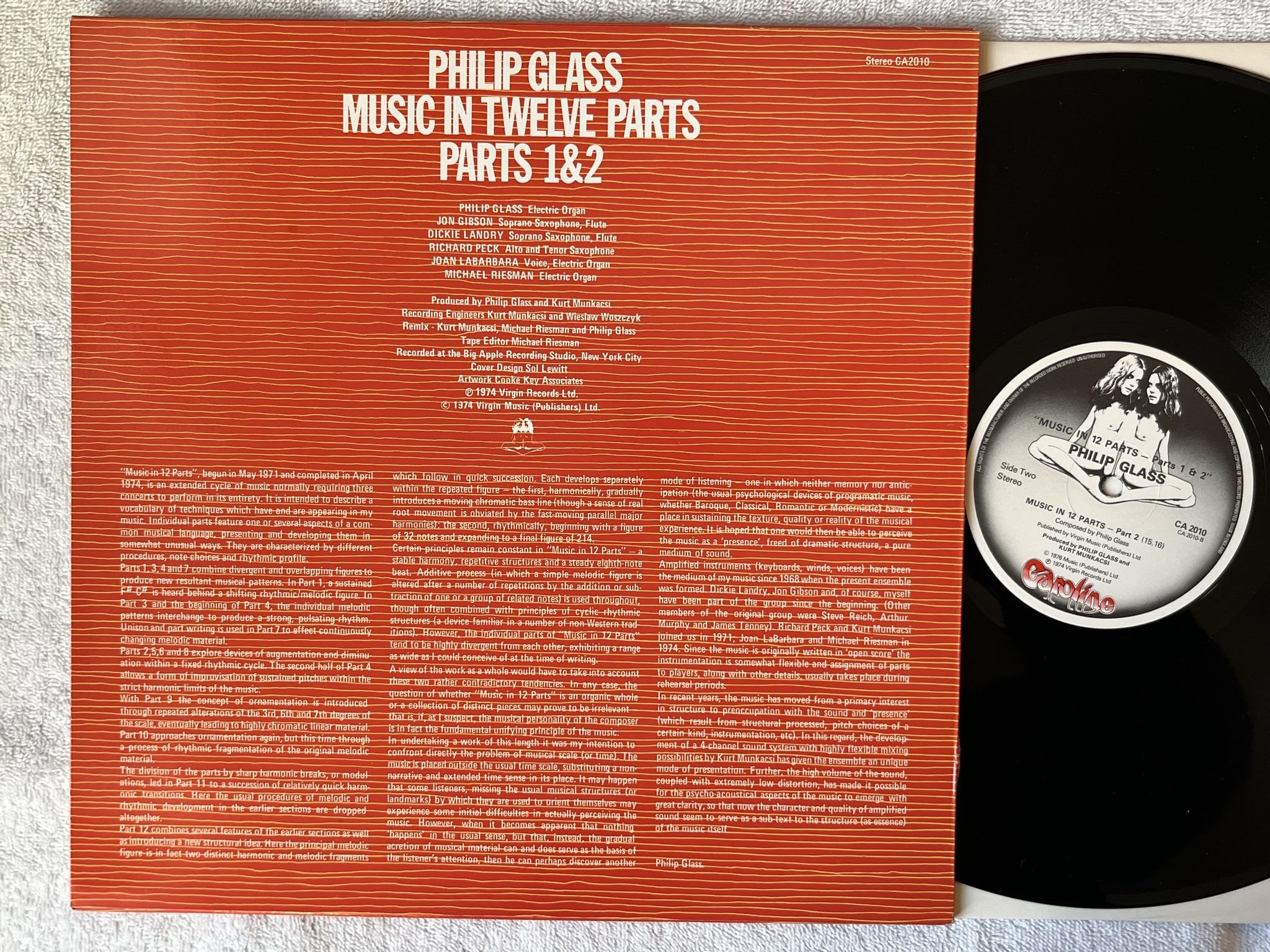 Omslagsbild för skivan PHILIP GLASS music in 12 parts pt I & pt II LP -76 CAROLINE CA 2010
