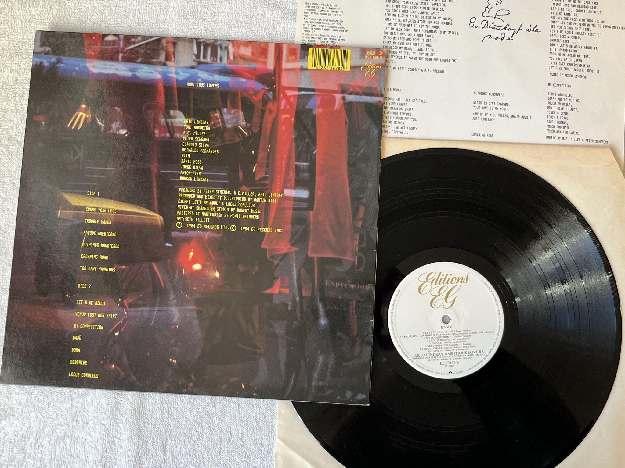 Omslagsbild för skivan ARTO LINDSAY / Ambitious Lovers LP -84 UK Editions EG EGED 39