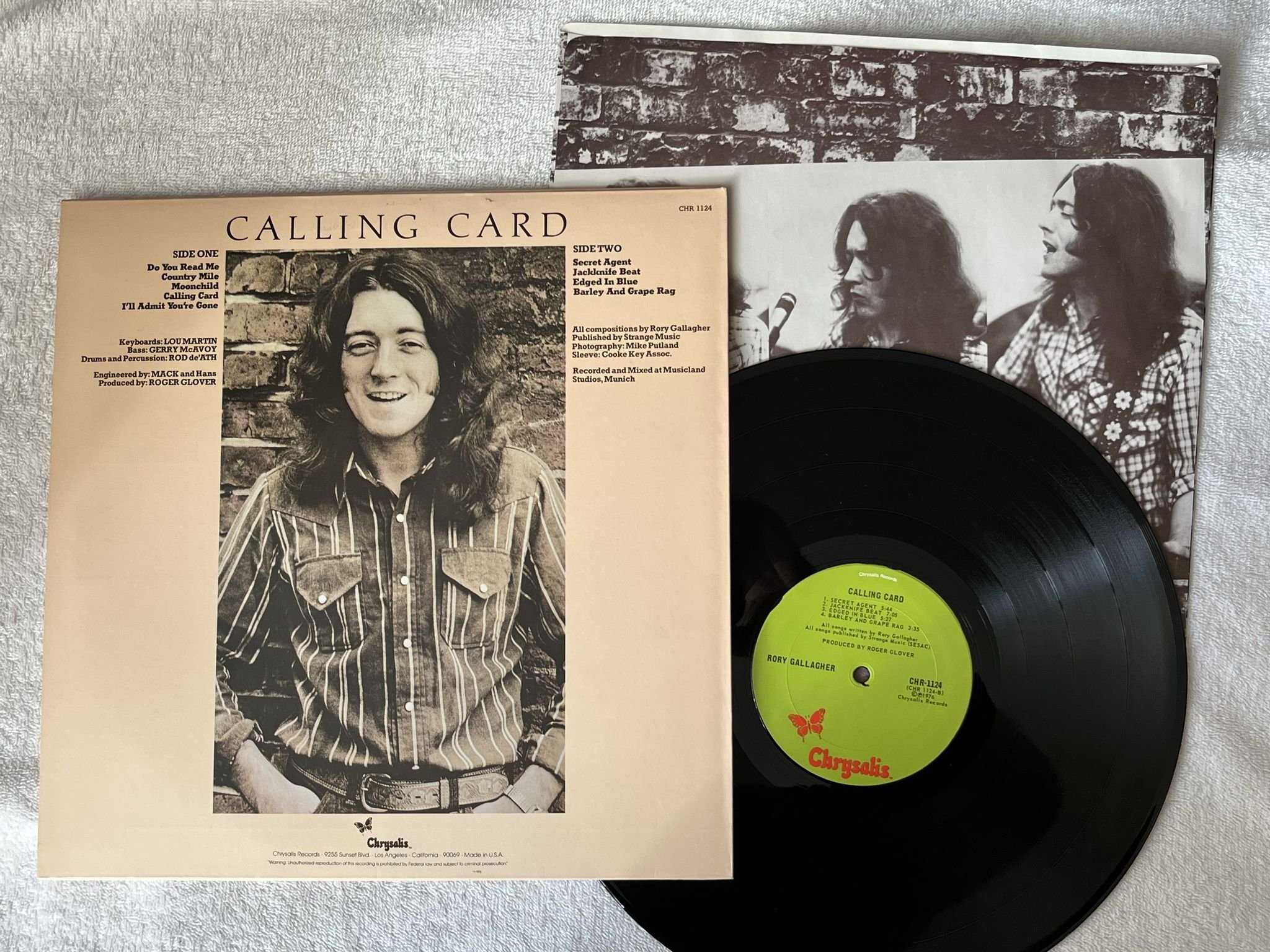 Omslagsbild för skivan RORY GALLAGHER calling card LP -76 US CHRYSALIS CHR 1124