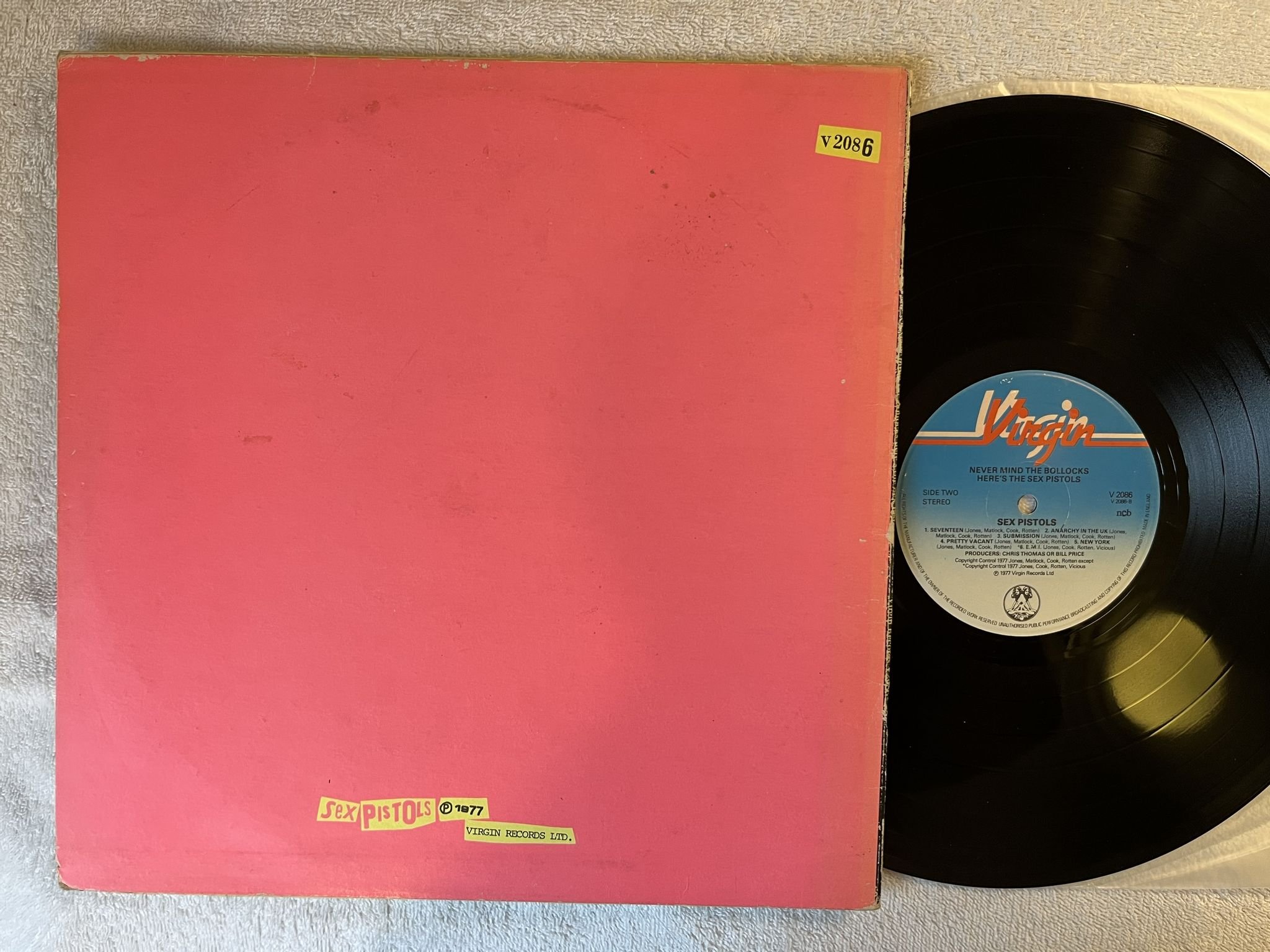 Omslagsbild för skivan SEX PISTOLS never mind the bollocks LP -77 ncb VIRGIN V 2086 *** BLANK BACK ***