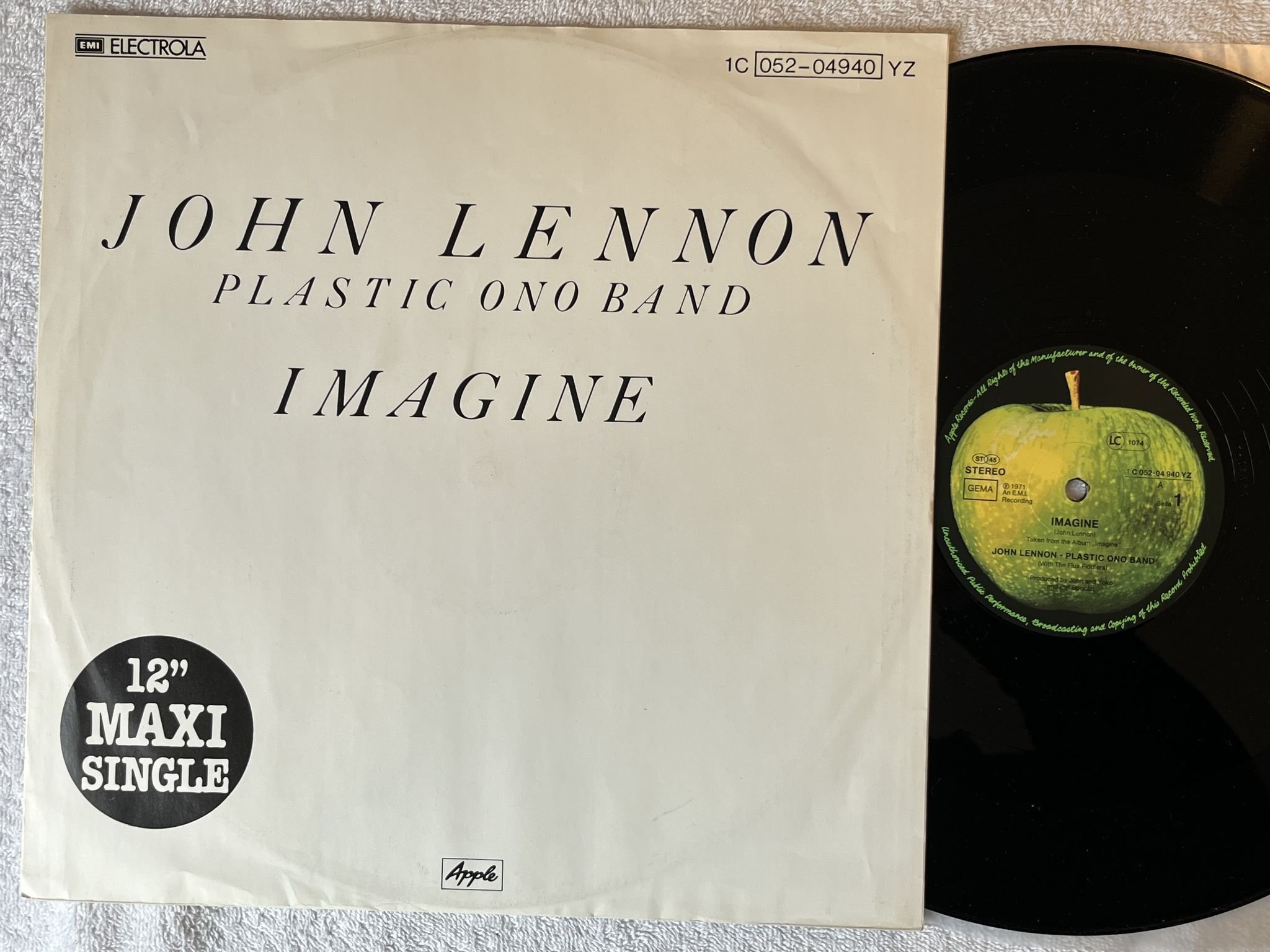 Omslagsbild för skivan JOHN LENNON - PLASTIC ONO BAND Imagine 12"Single -81 Ger APPLE 1C 052-04940 YZ