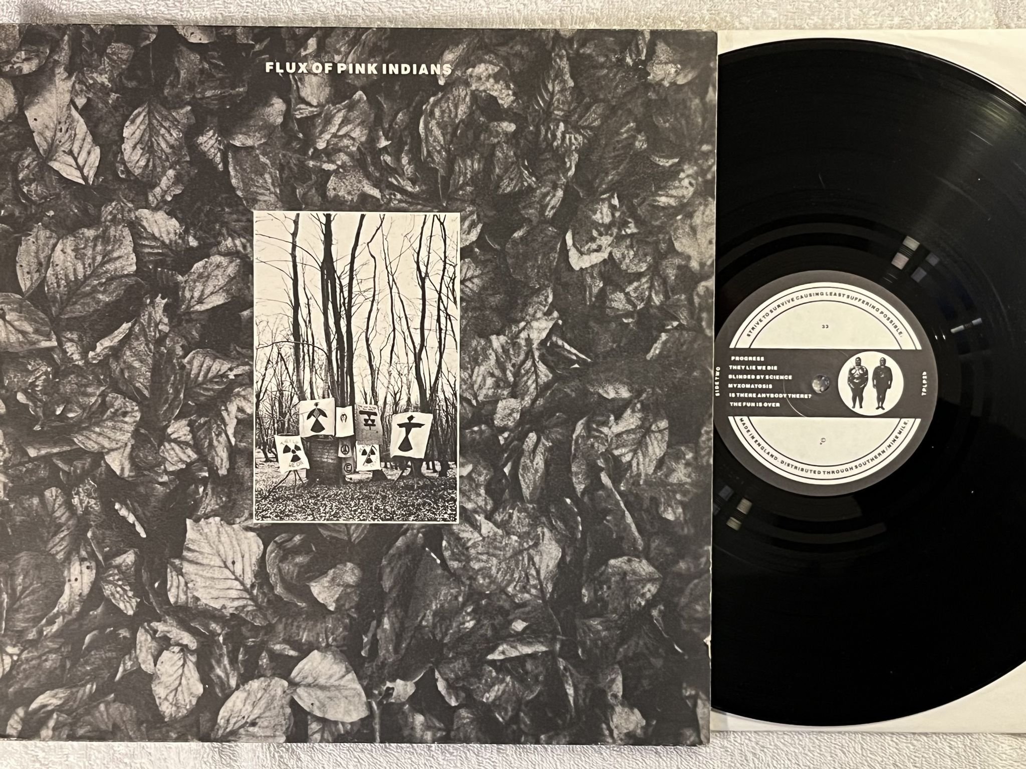 Omslagsbild för skivan FLUX OF PINK INDIANS Strive To Survive LP -87 UK ONE LITTLE INDIAN TPLP2 *PUNK*