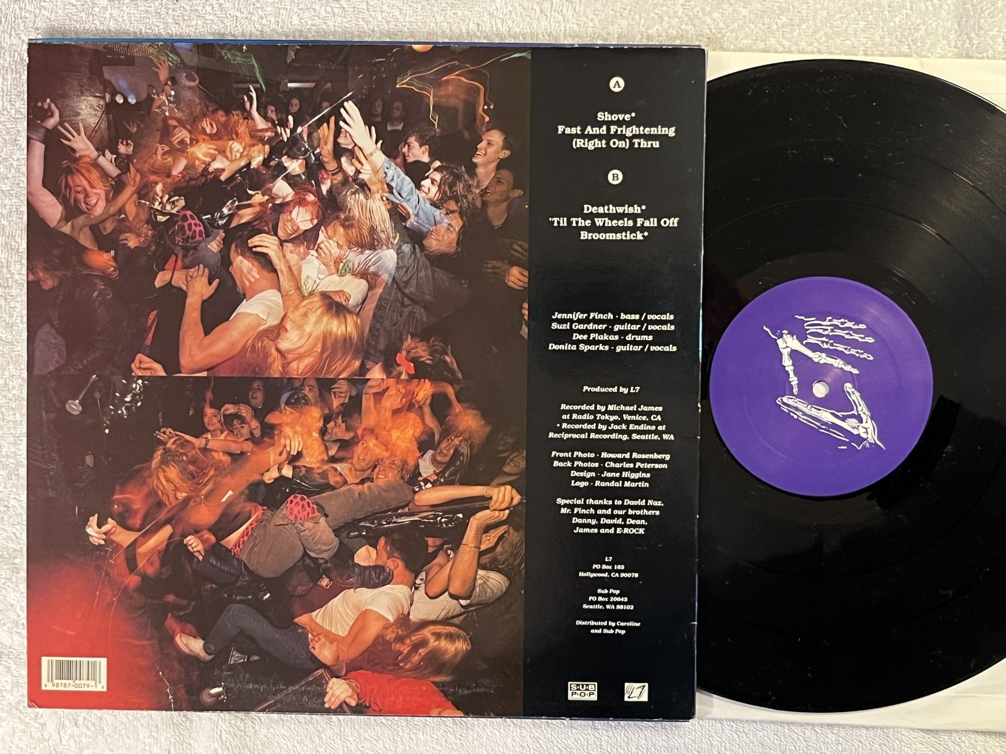 Omslagsbild för skivan L7 Smell The Magic 12"ep -90 US SUB POP SP79 *** Grunge ***