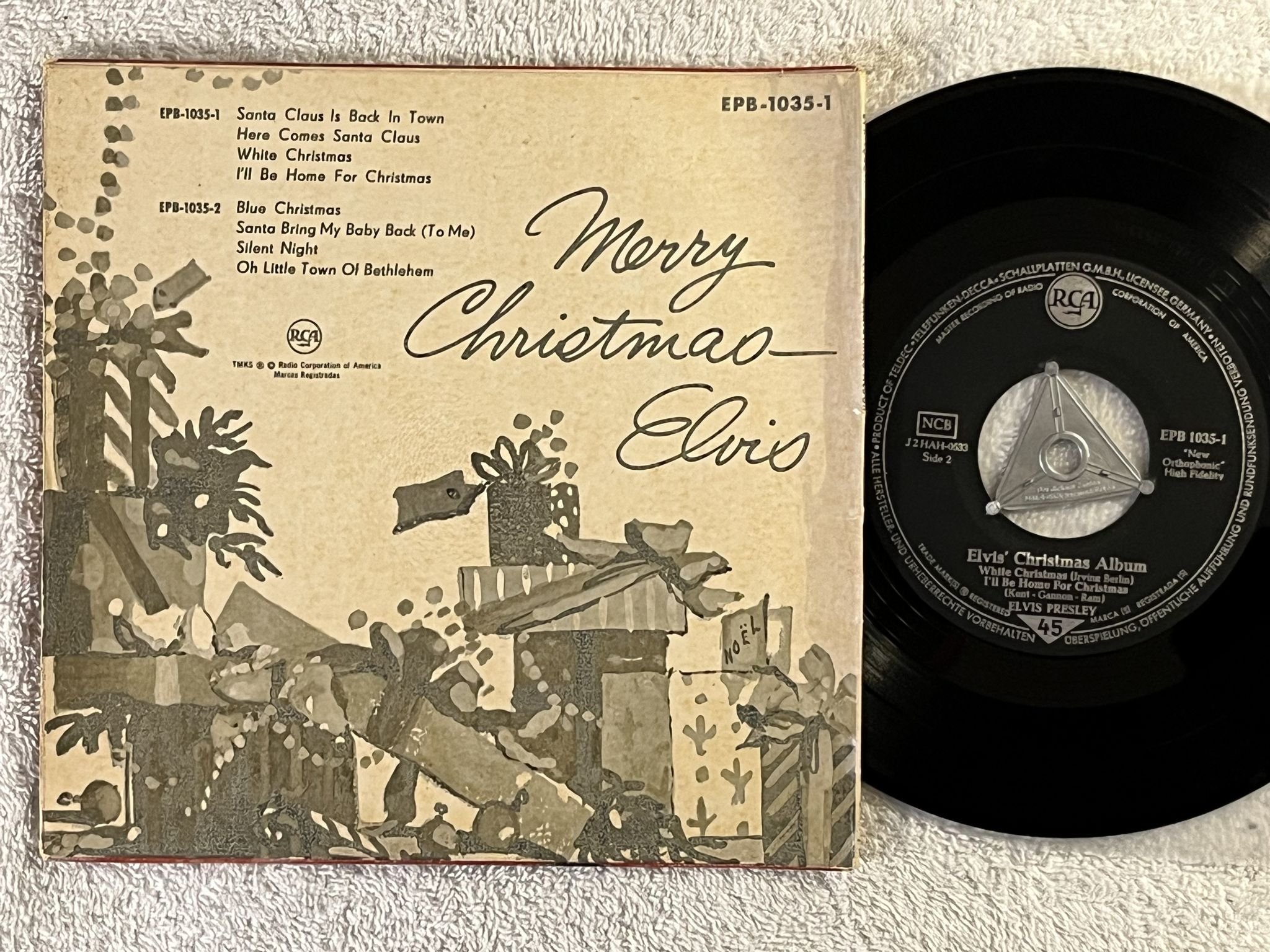 Omslagsbild för skivan ELVIS PRESLEY Elvis Christmas Album 7"ep -58 Ger NCB RCA EPB-1035-1