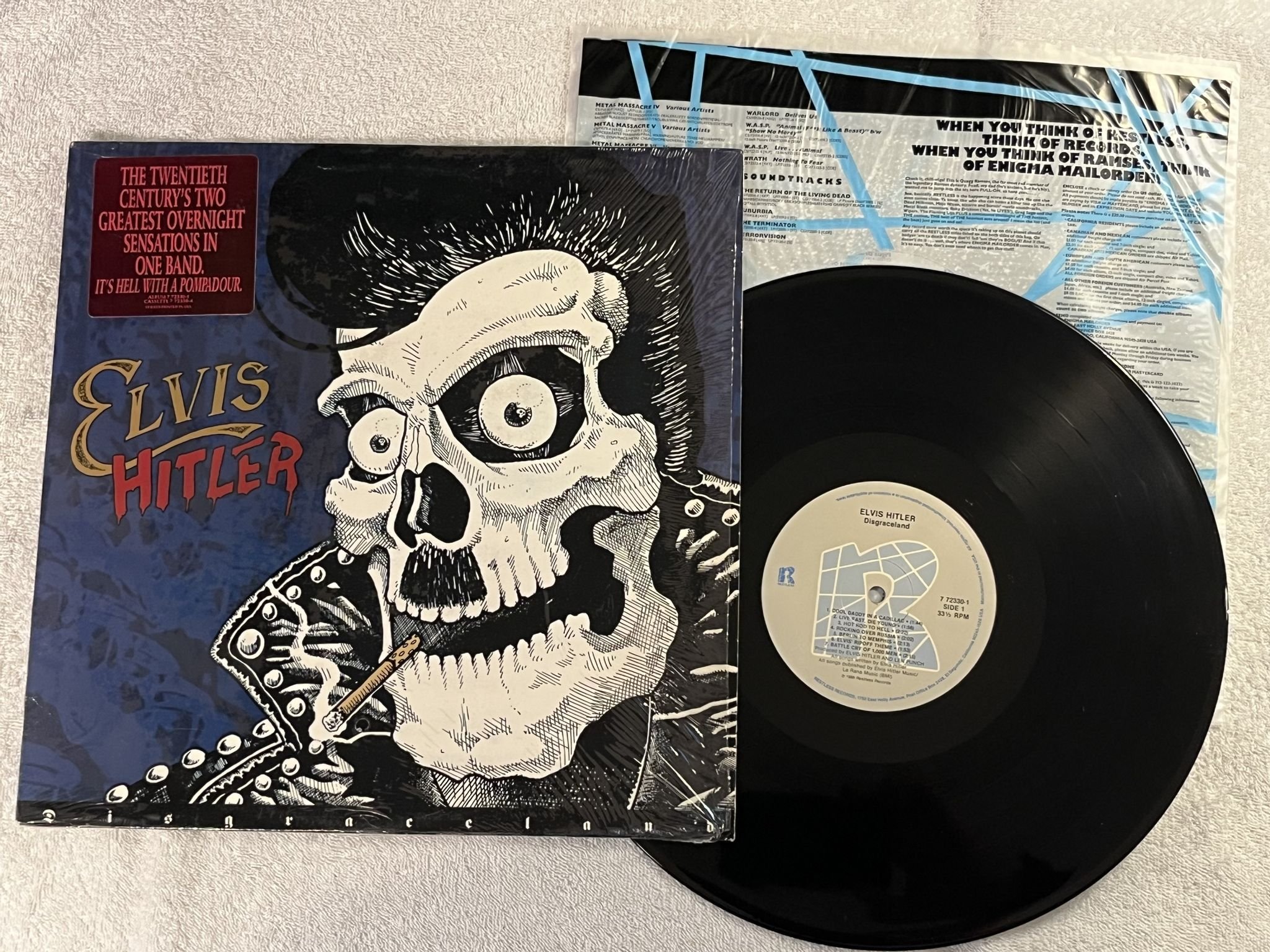 Omslagsbild för skivan ELVIS HITLER Disgraceland LP -88 US RESTLESS 772330-1 ** PSYCHOBILLY **