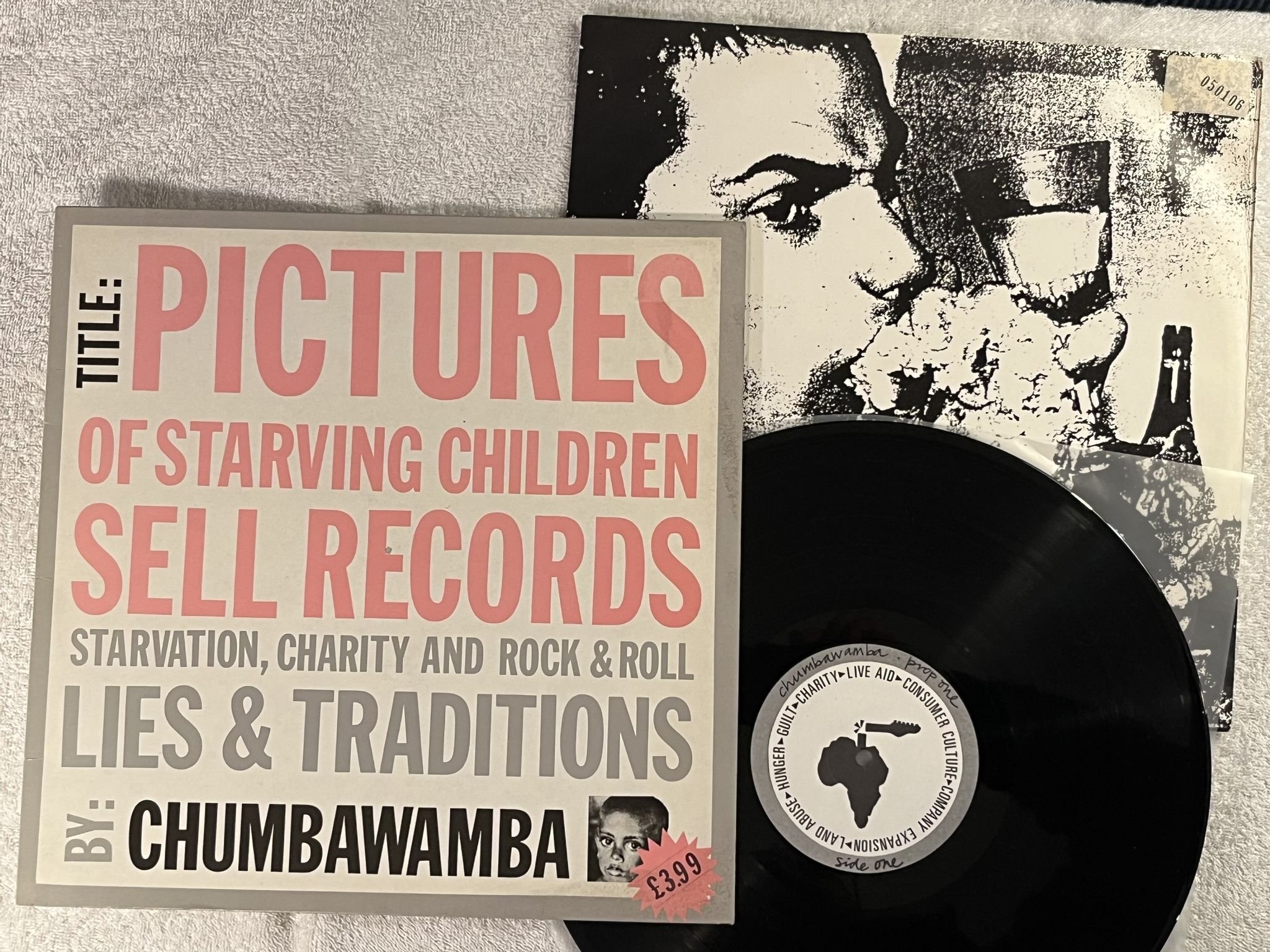 Omslagsbild för skivan Chumbawamba – Pictures Of Starving Children LP -86 AGIT PROP Prop One