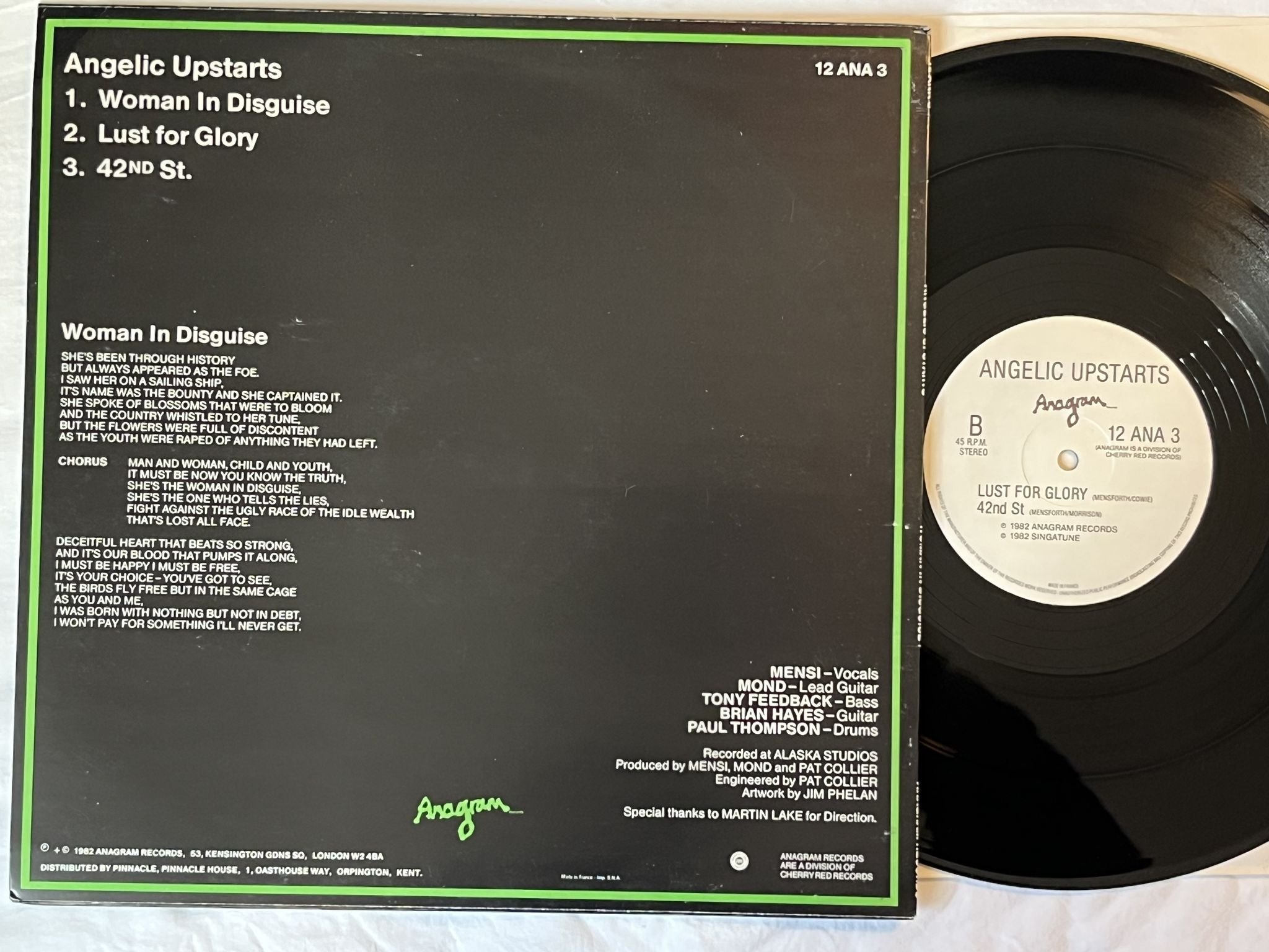 Omslagsbild för skivan ANGELIC UPSTARTS Woman In Disguise 12" -82 UK anagram 12 ANA 3