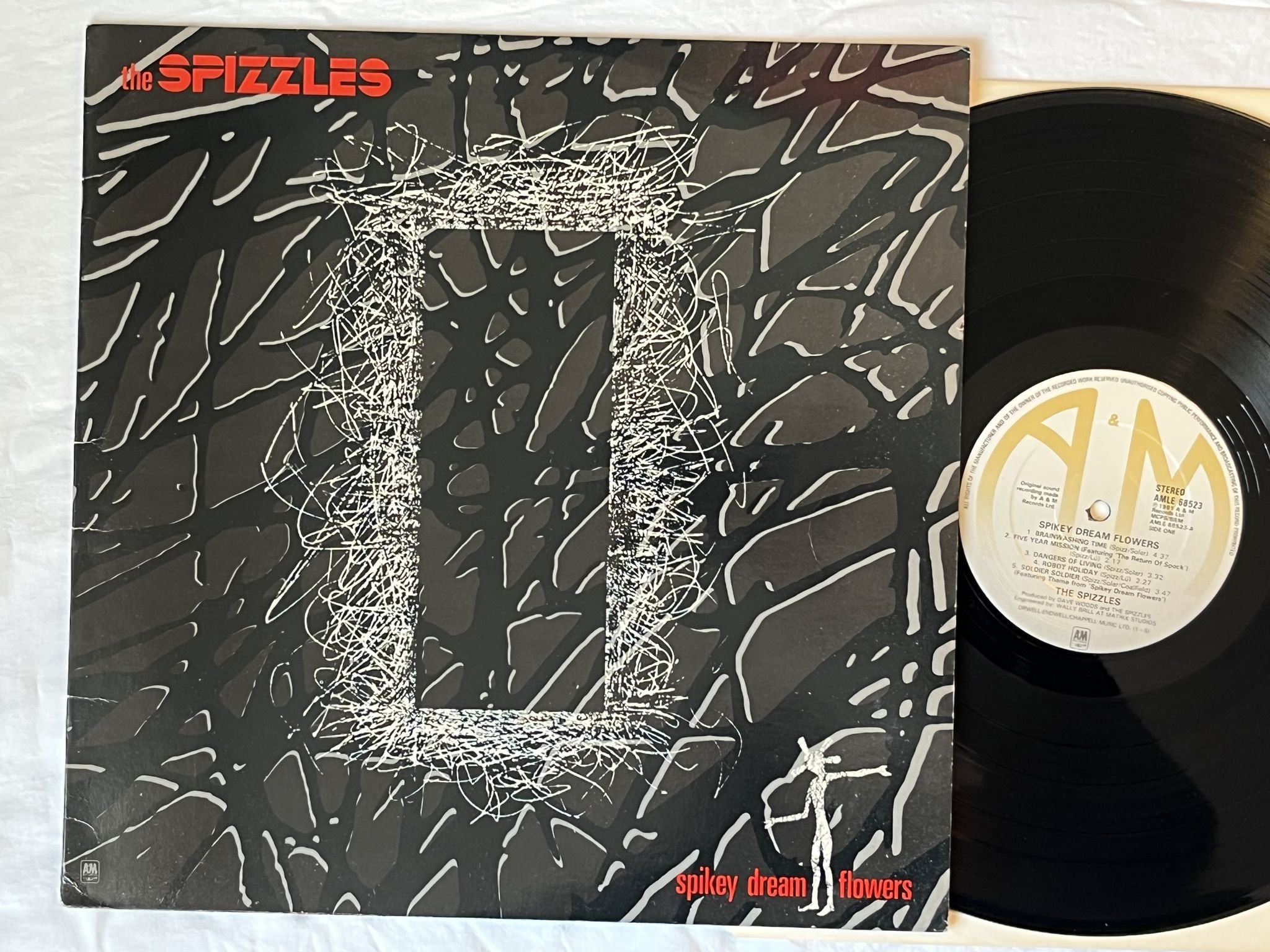 Omslagsbild för skivan THE SPIZZLES Spikey Dream Flowers LP -81 UK A&M AMLE 68523