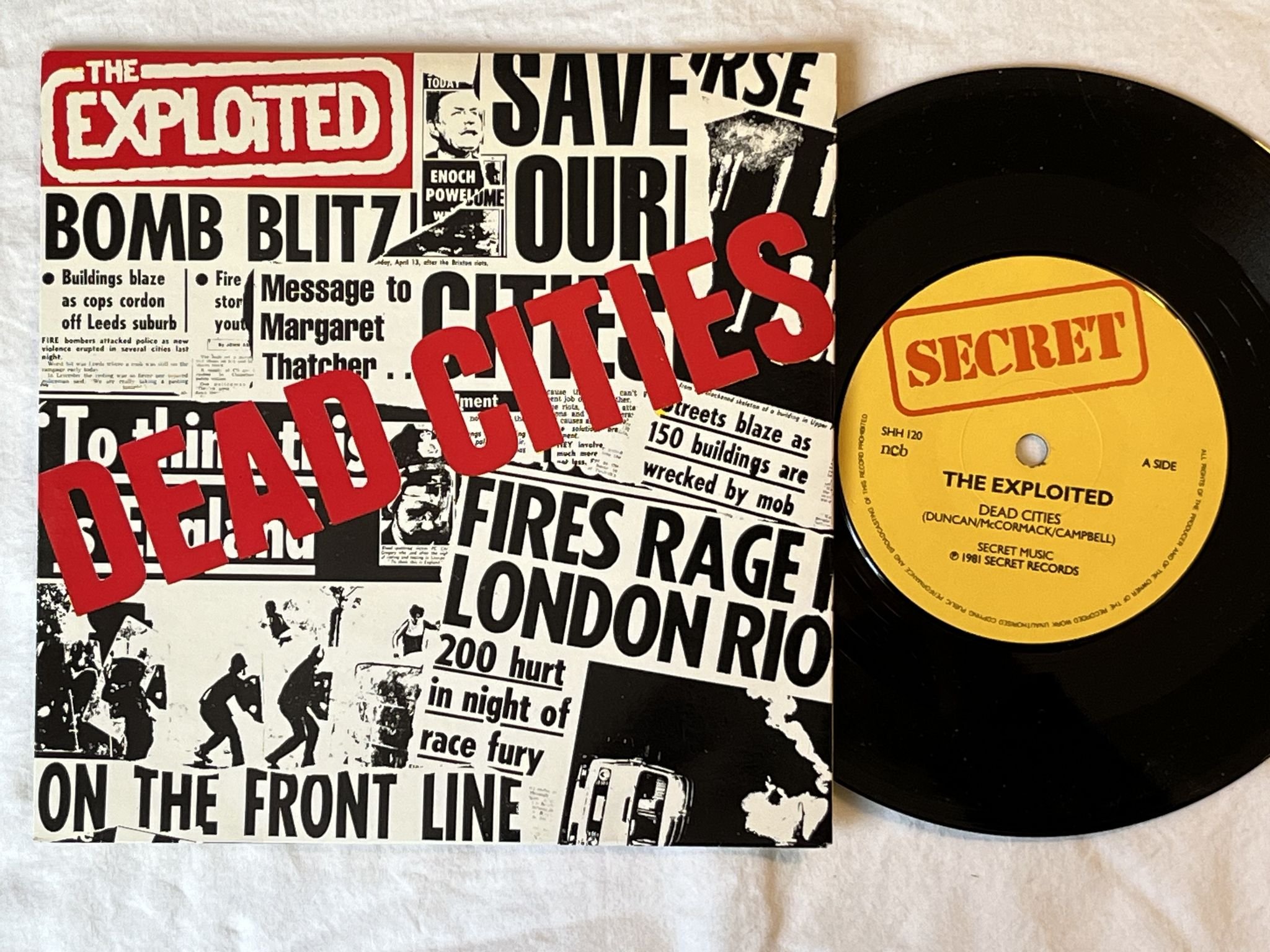 Omslagsbild för skivan THE EXPLOITED Dead Cities 7" -81 ncb SECRET SHH 120