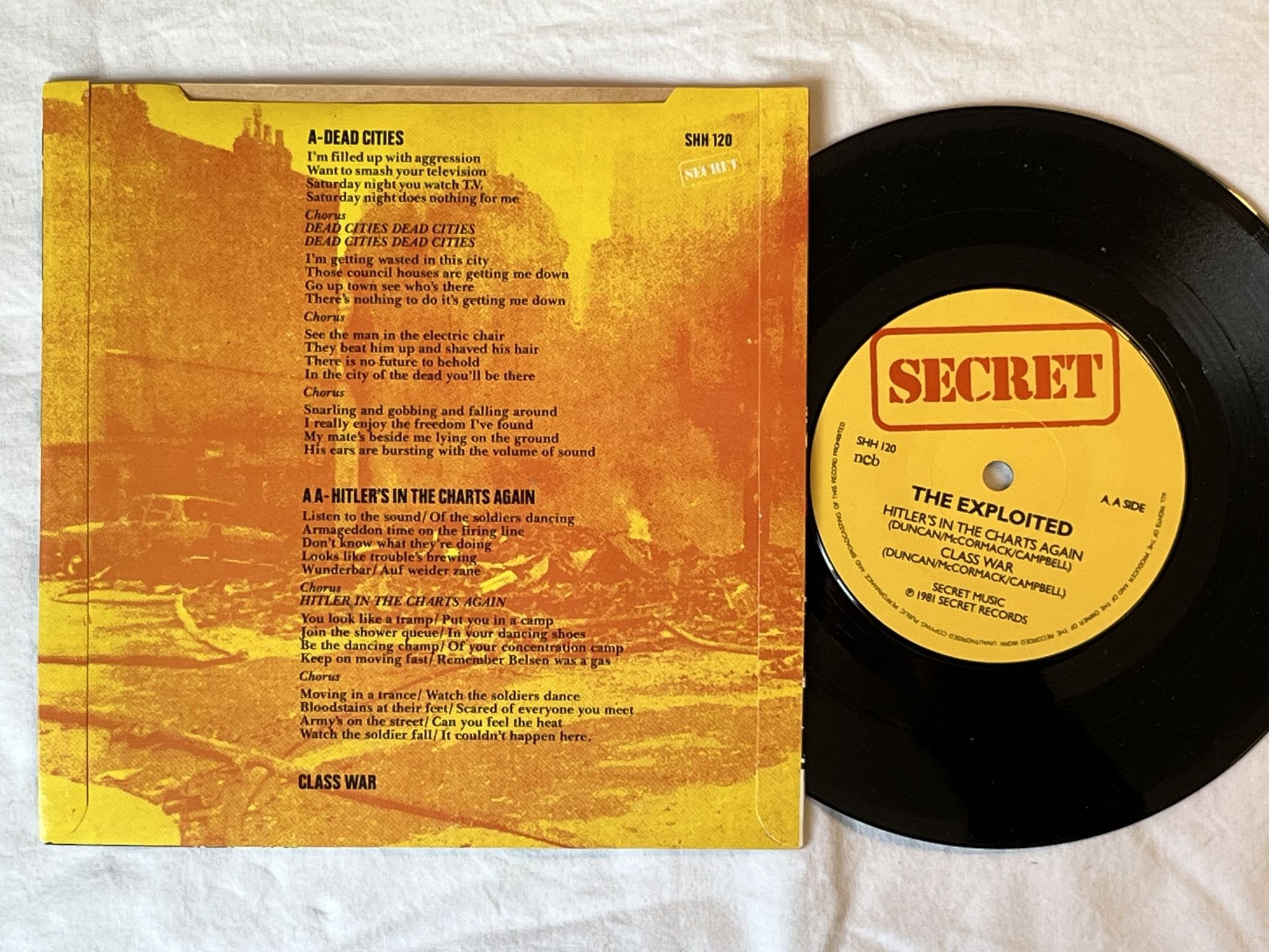 Omslagsbild för skivan THE EXPLOITED Dead Cities 7" -81 ncb SECRET SHH 120