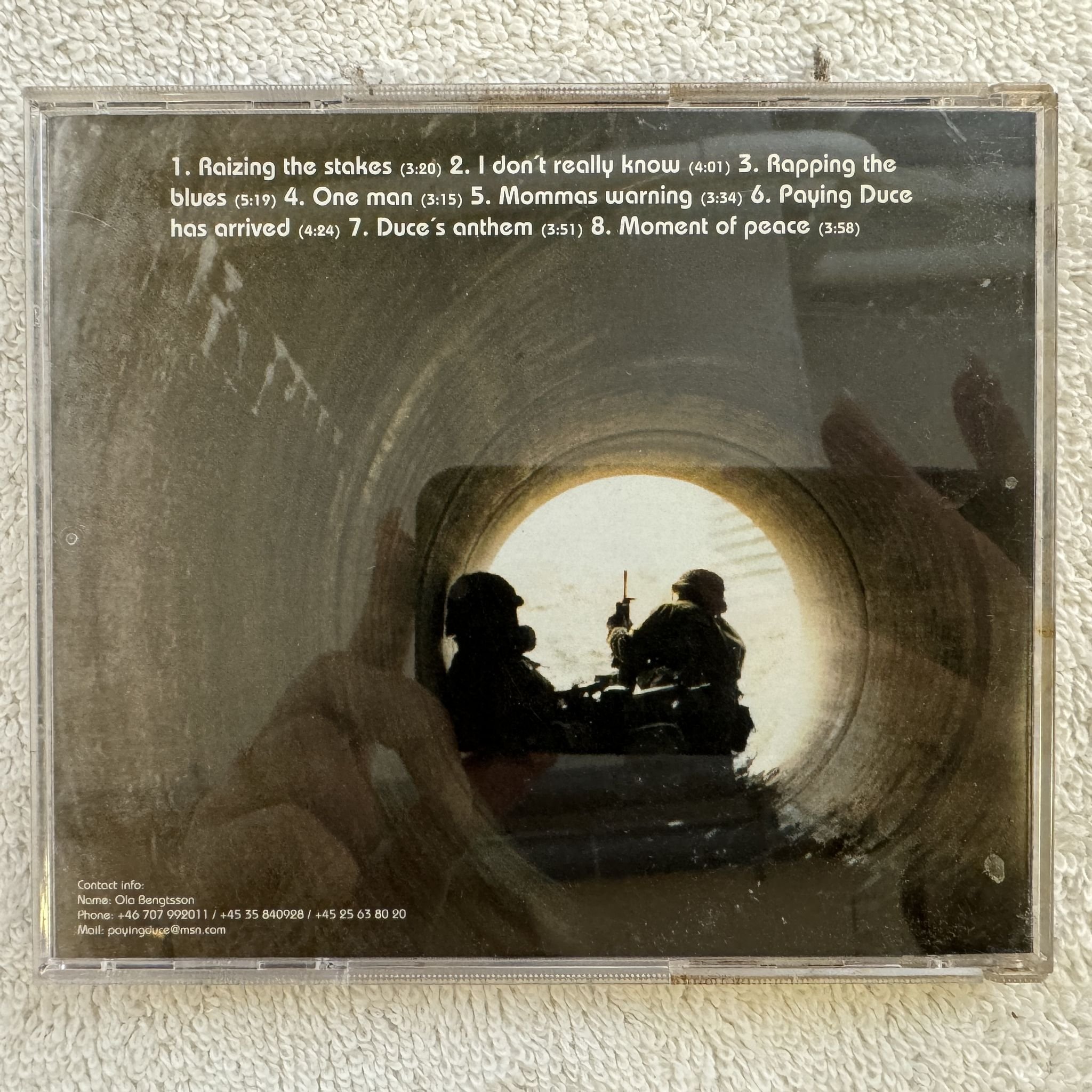 Omslagsbild för skivan PAYING DUCE life in a foxhole CD demo SWERAP