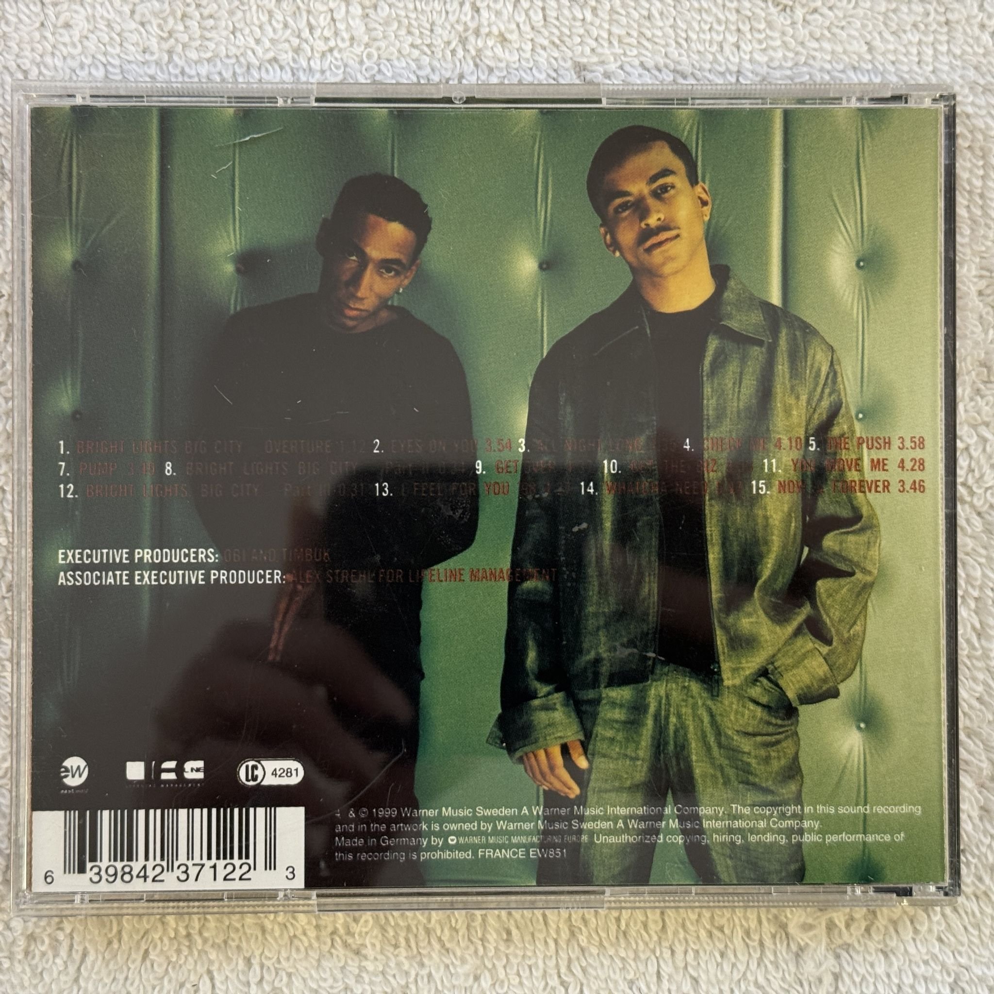 Omslagsbild för skivan EXCEL Bright Lights Big City CD -99 WARNER 3984-23712-2 SWERAP