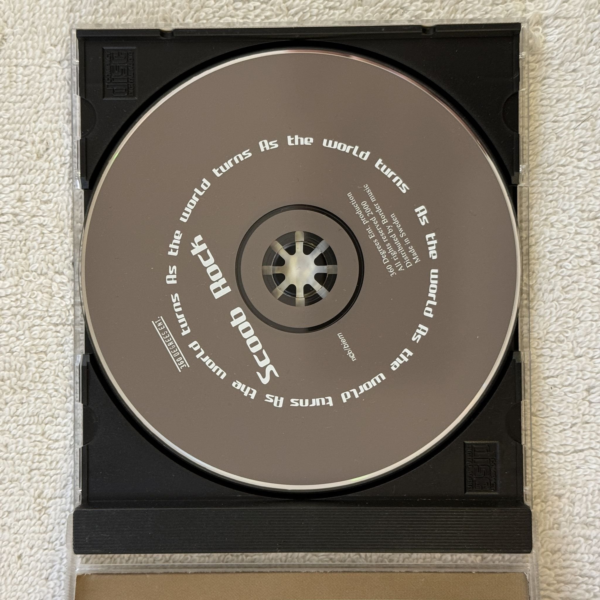 Omslagsbild för skivan Scoob Rock – As The World Turns CD 2000 360 Degrees Ent. SWERAP