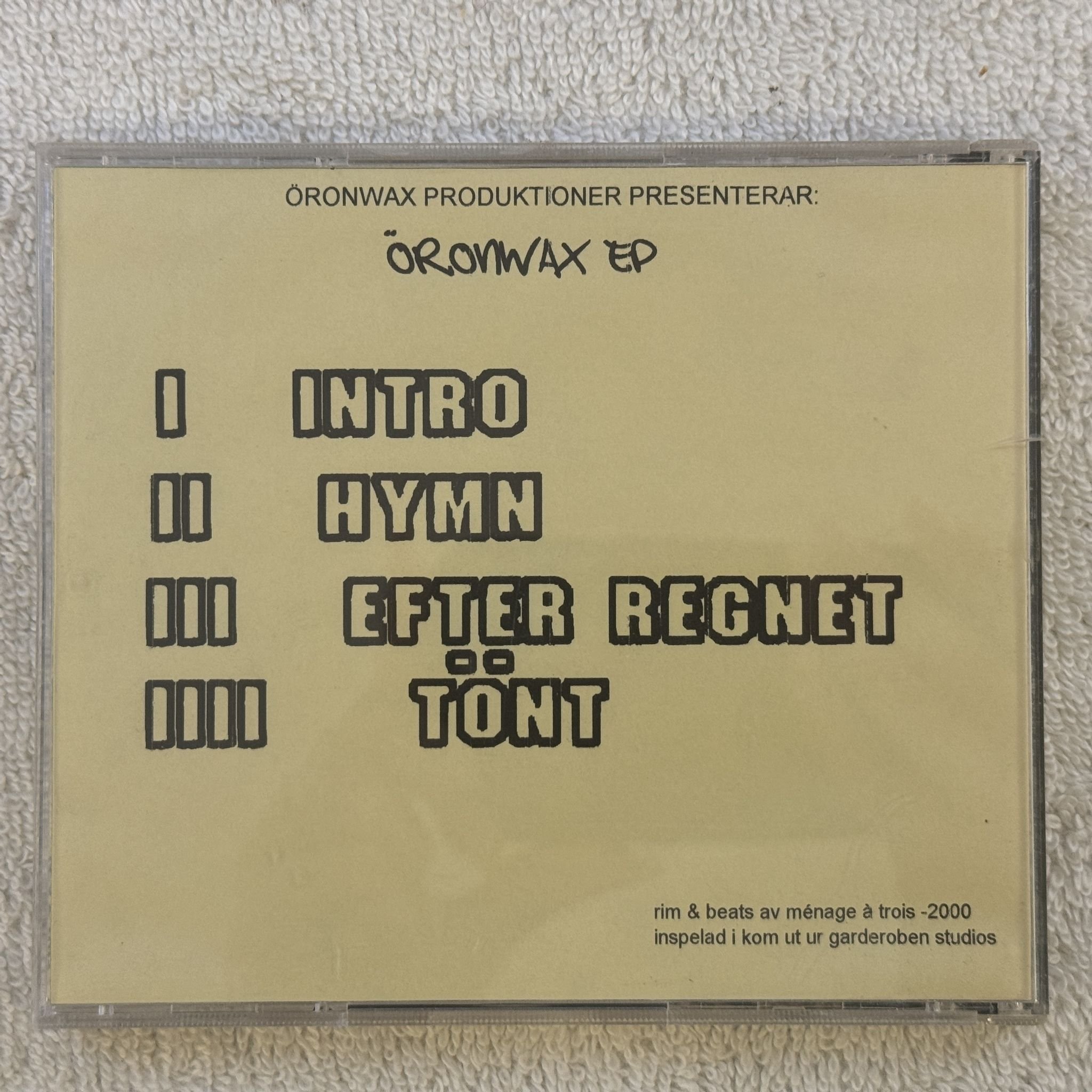 Omslagsbild för skivan MENACE A TROIS öronwax ep CD 2000 demo SWERAP