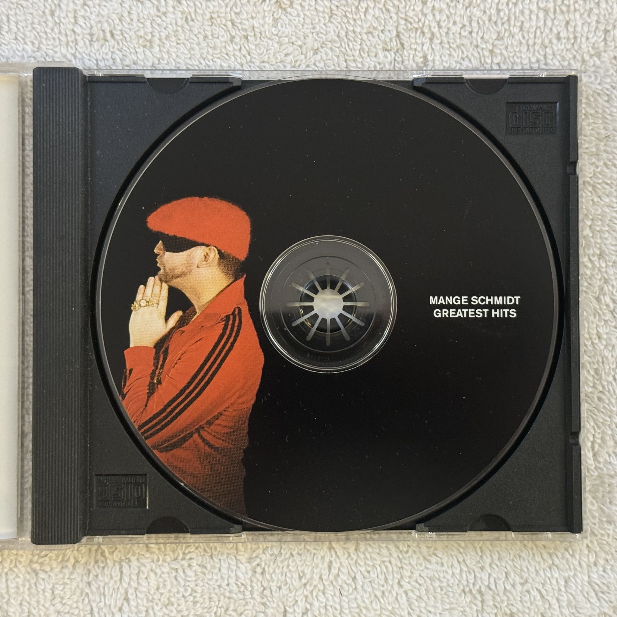 Omslagsbild för skivan Mange Schmidt – Greatest Hits CD 2003 private release SWERAP
