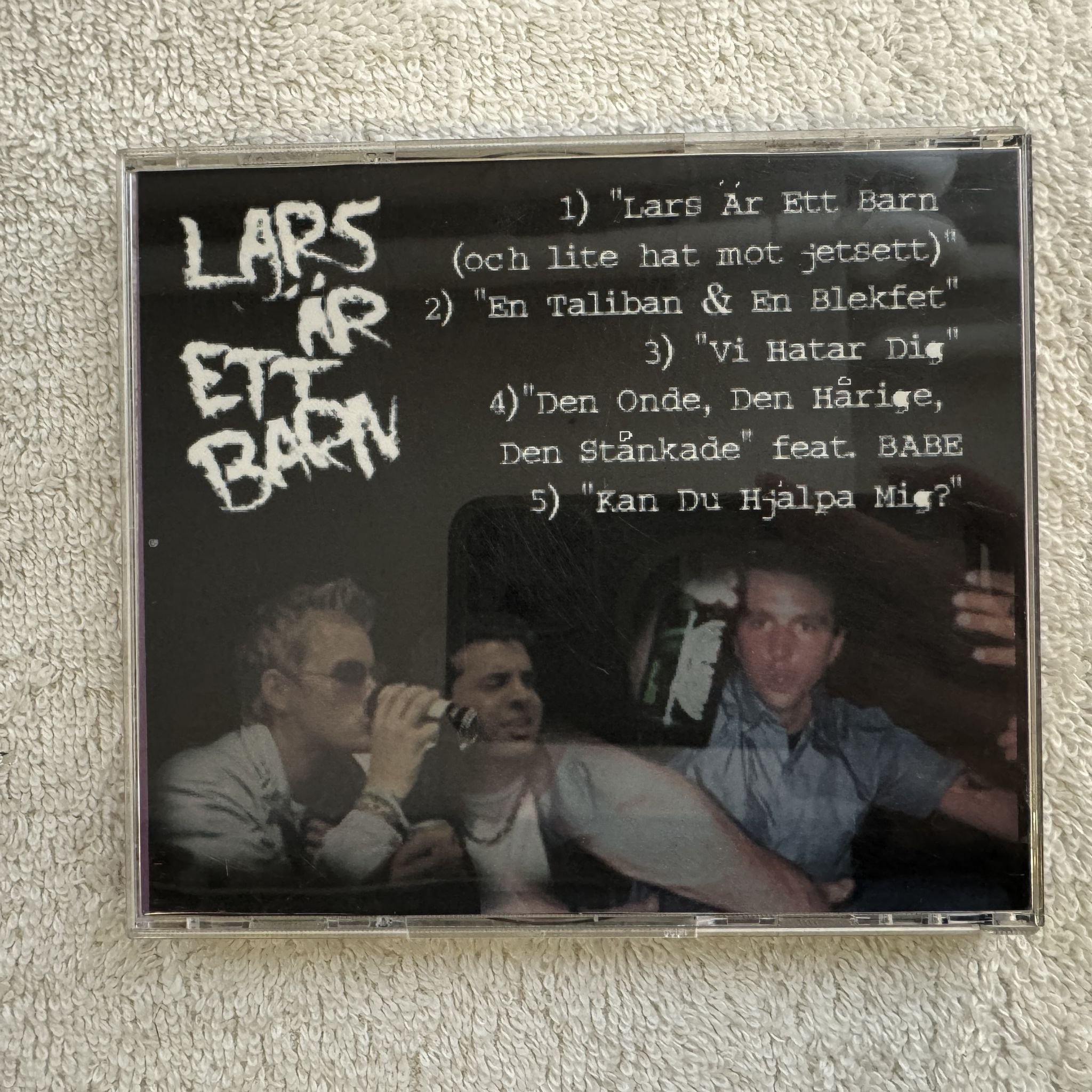 Omslagsbild för skivan LARS ÄR ETT BARN ett glas kiss, tack! CD 200? demo SWERAP