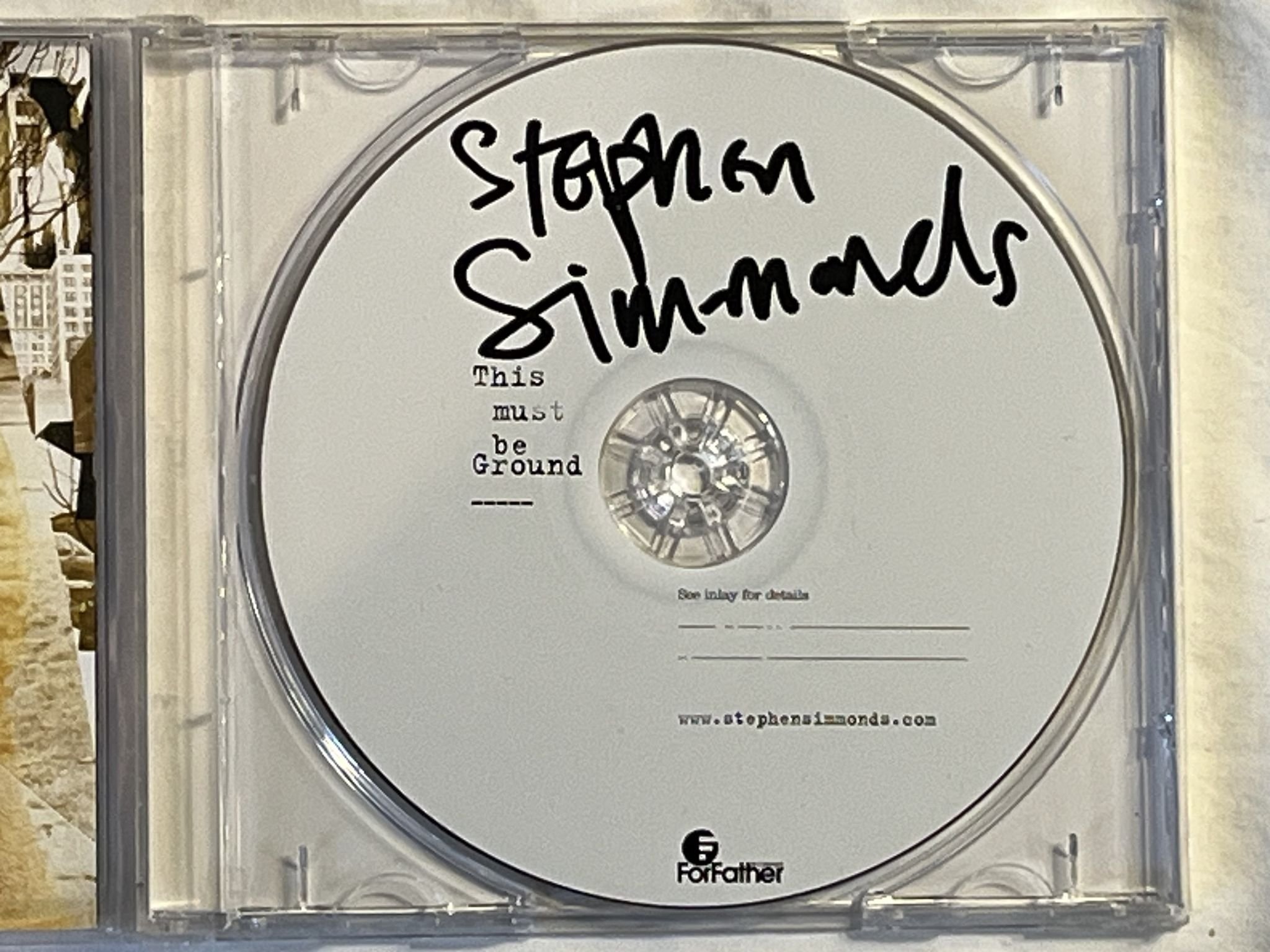 Omslagsbild för skivan STEPHEN SIMMONDS This Must Be Ground CD 2004 PGMLCD39 *** SIGNED ***