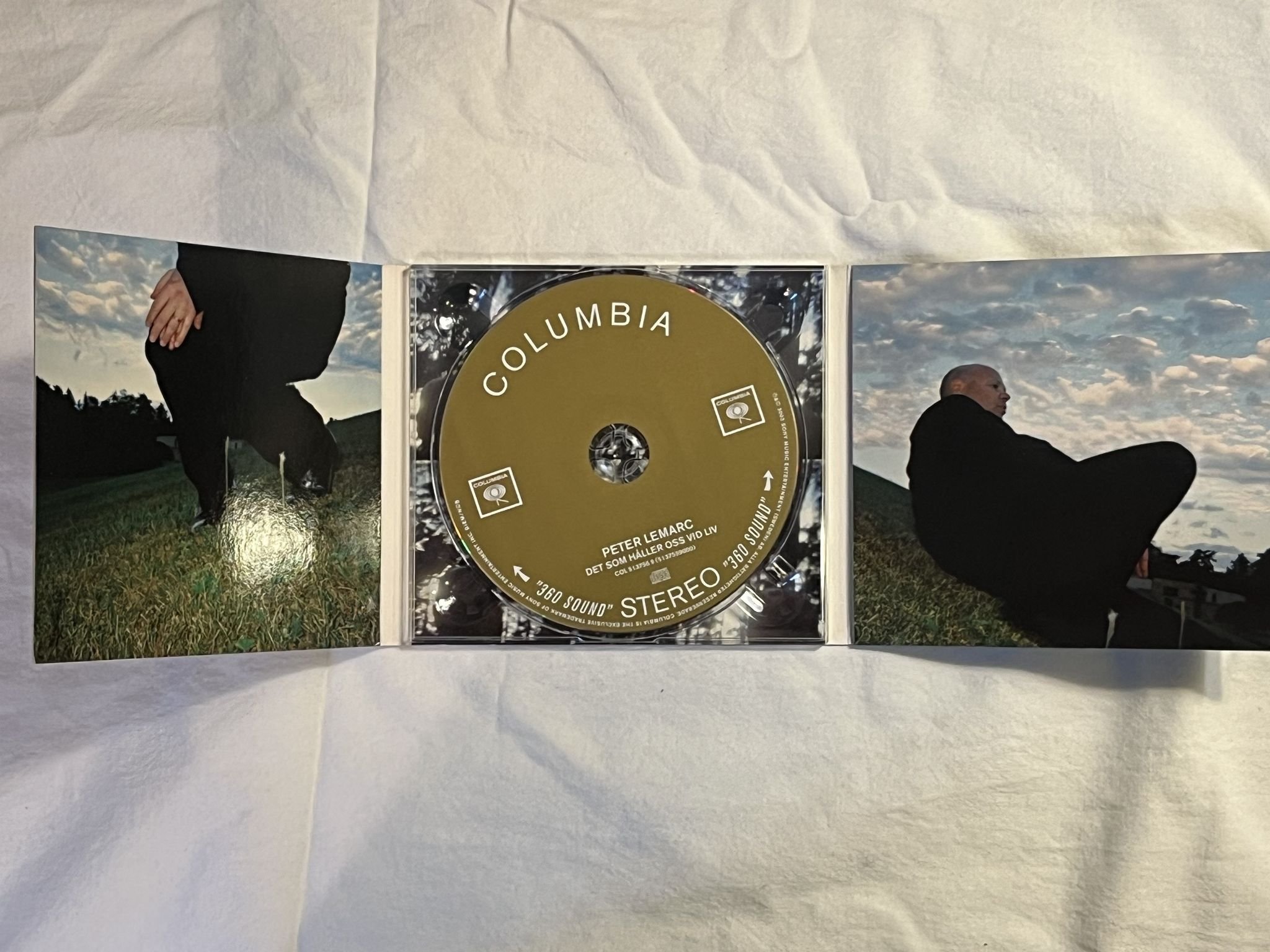 Omslagsbild för skivan PETER LeMARC det som håller oss vi liv CD 2003 COLUMBIA 513755200 ** SIGNED **