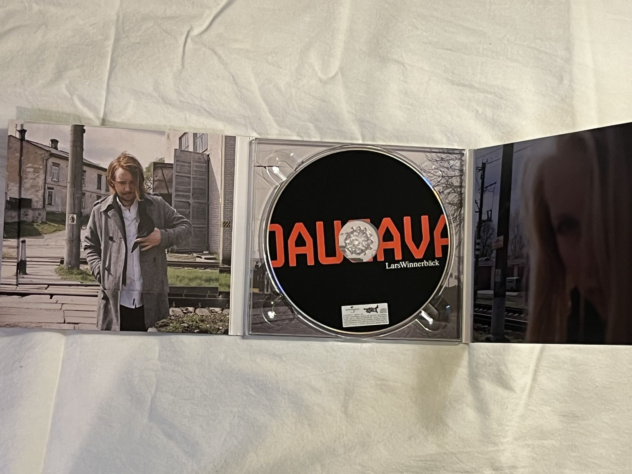 Omslagsbild för skivan LARS WINNERBÄCK daugava CD 2007 SONET 060251742139 *** SIGNED ***