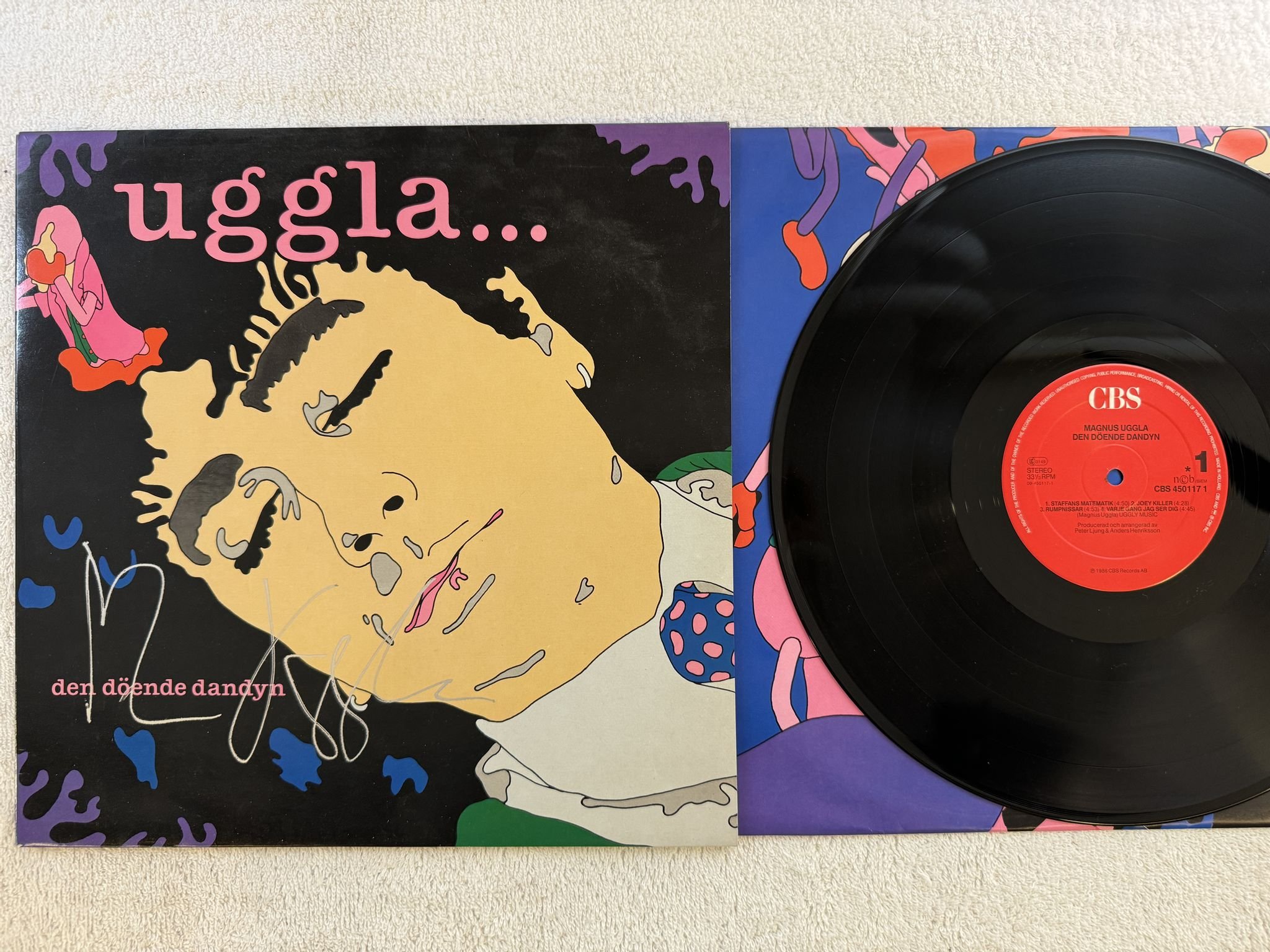Omslagsbild för skivan MAGNUS UGGLA den döende dandyn LP -86 CBS 4501171 *** SIGNED ***