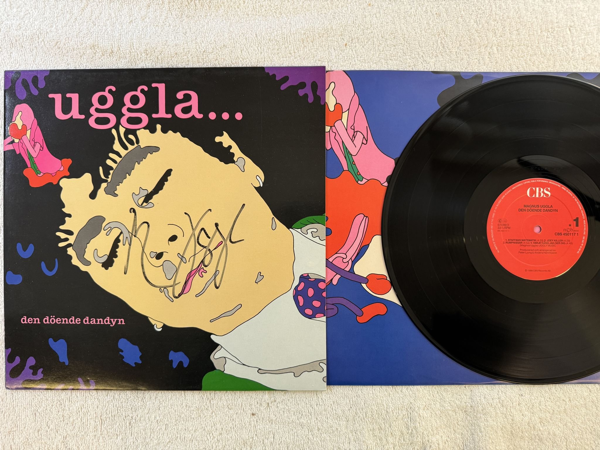 Omslagsbild för skivan MAGNUS UGGLA den döende dandyn LP -87 CBS 4501171 *** SIGNED ***