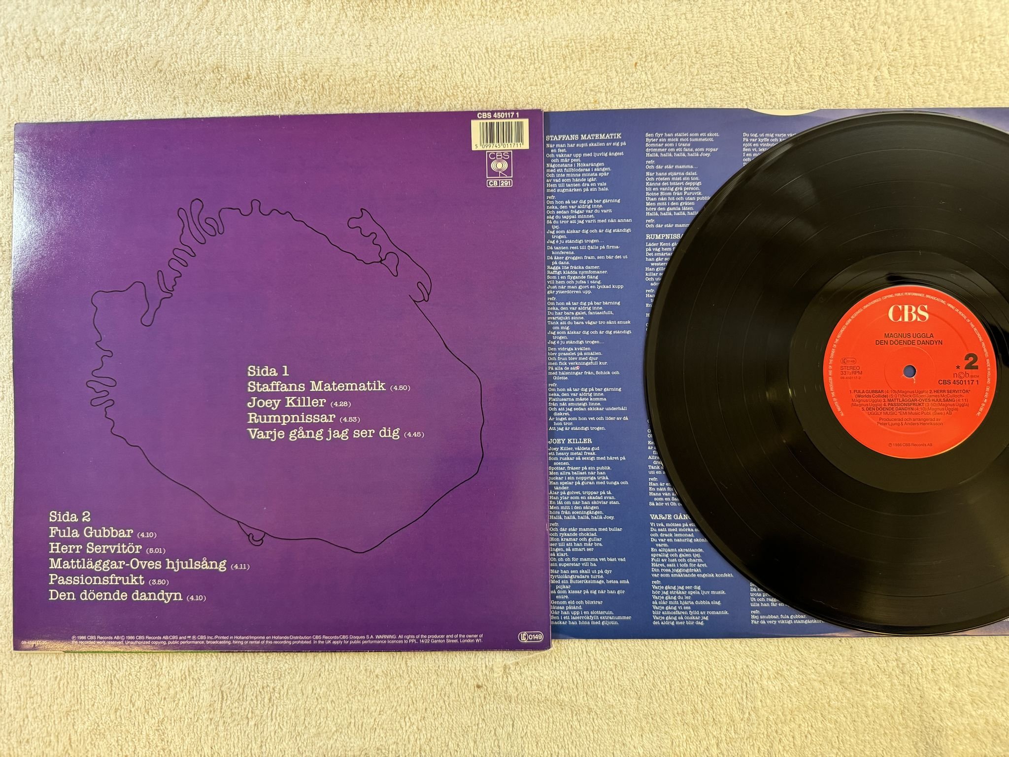 Omslagsbild för skivan MAGNUS UGGLA den döende dandyn LP -87 CBS 4501171 *** SIGNED ***