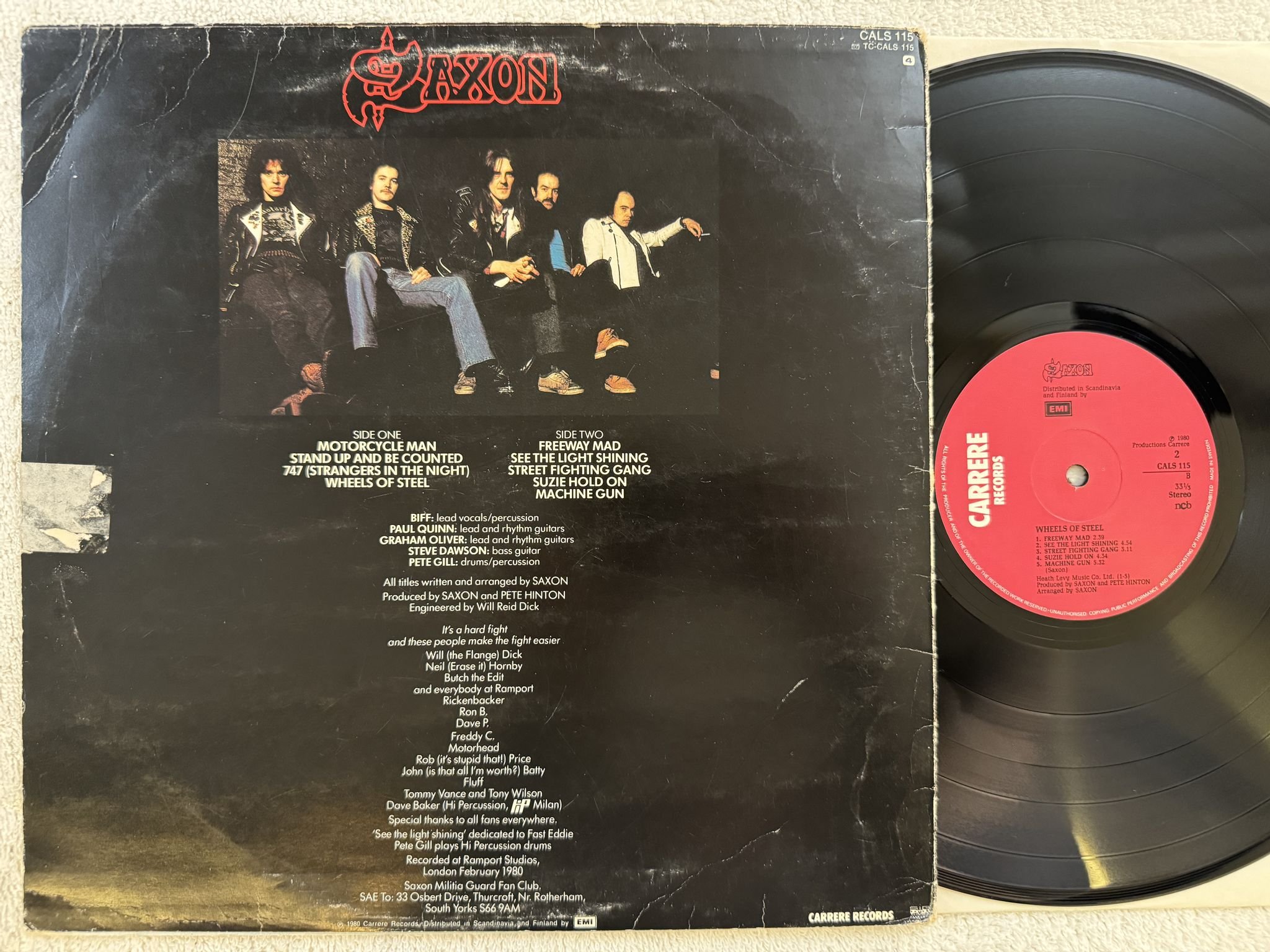 Omslagsbild för skivan SAXON Wheels Of Steel LP -80 ncb CARRERE CALS 115 *** SIGNED ***