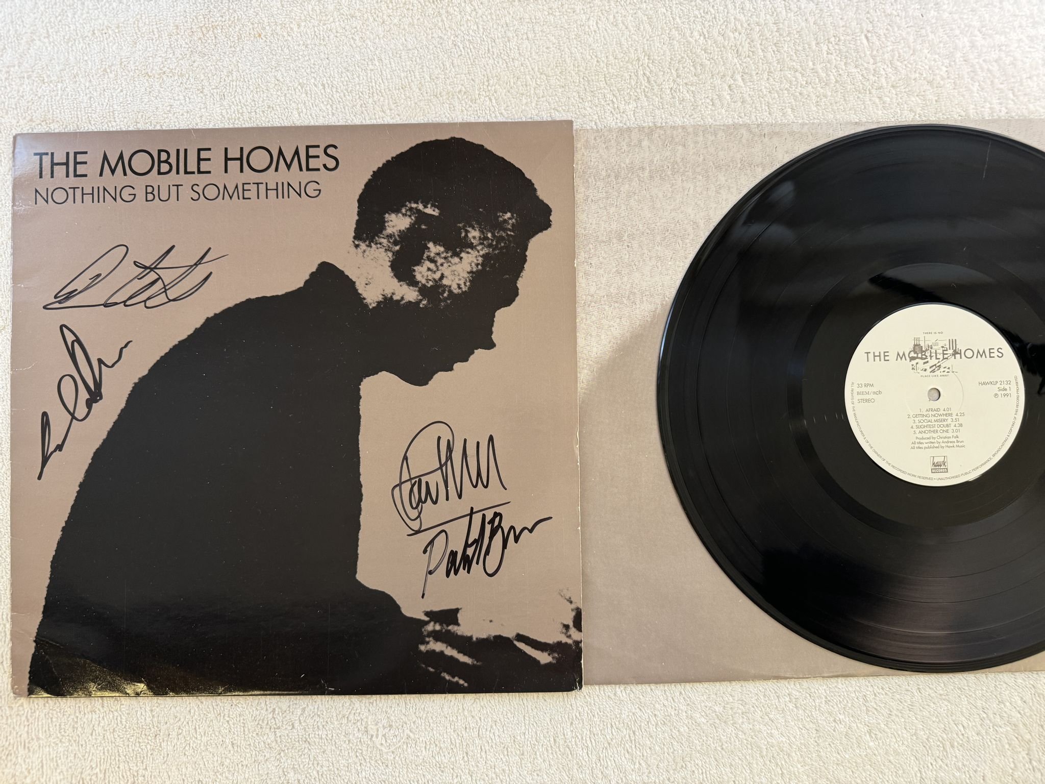 Omslagsbild för skivan THE MOBILE HOMES nothing but something LP -91 Swe HAWKLP 2132 ** SIGNED **