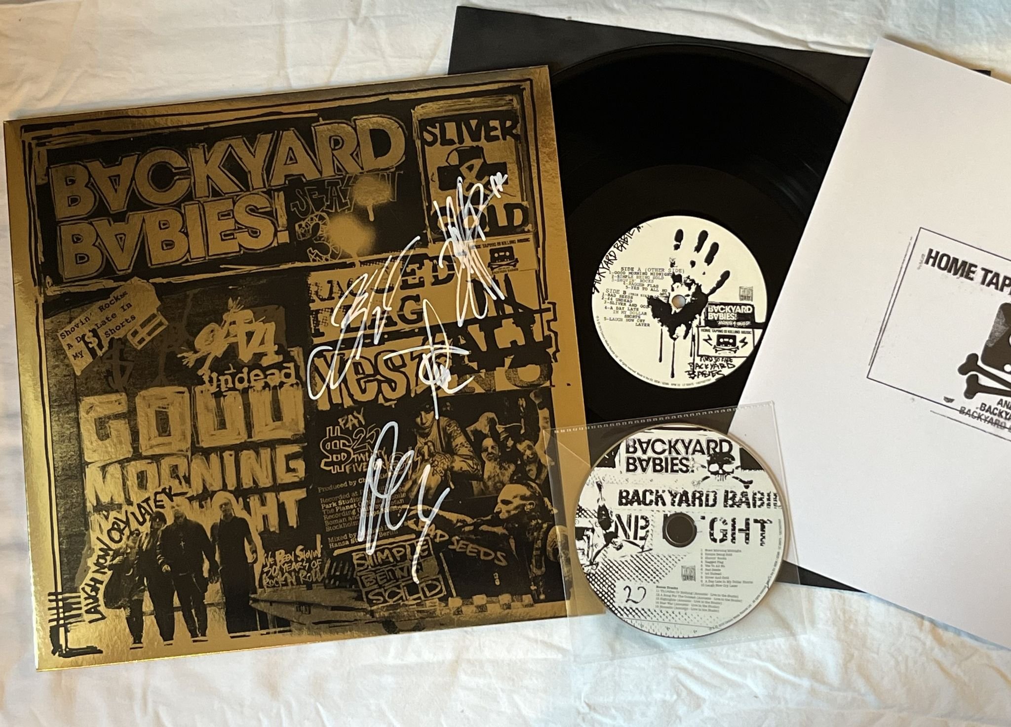 Omslagsbild för skivan BACKYARD BABIES Sliver & Gold LP+cd 2019 century media 19075927001 ** SIGNED **