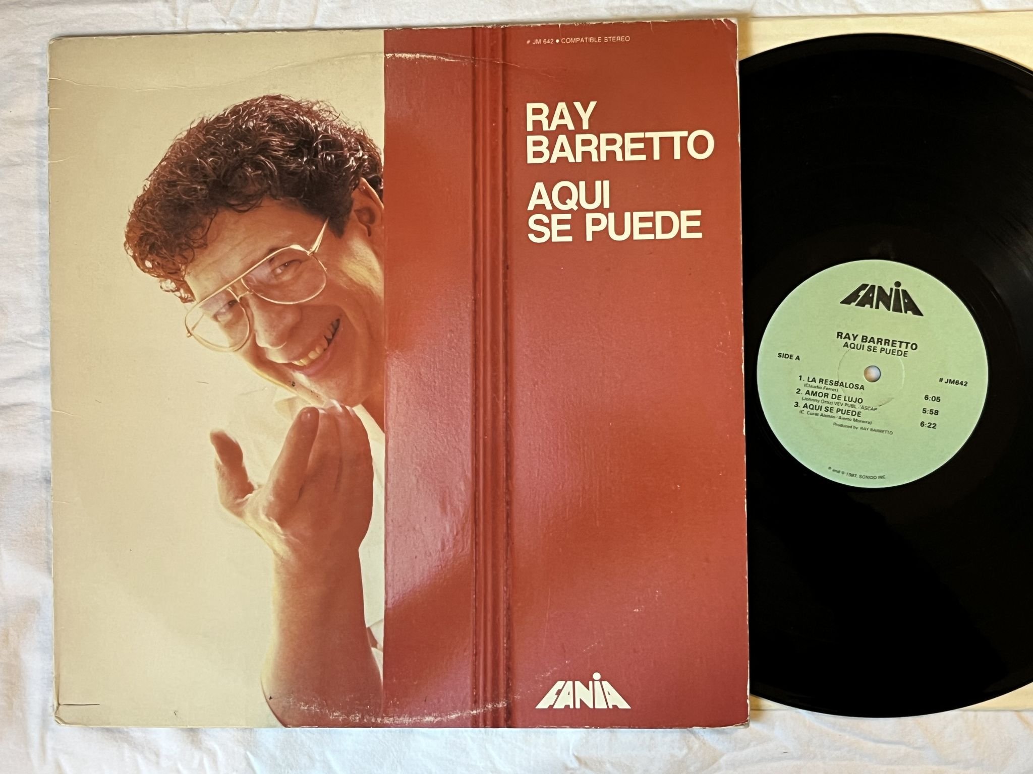 Omslagsbild för skivan RAY BARRETTO aqui se puede LP -87 FANIA JM 642 ** SIGNED **