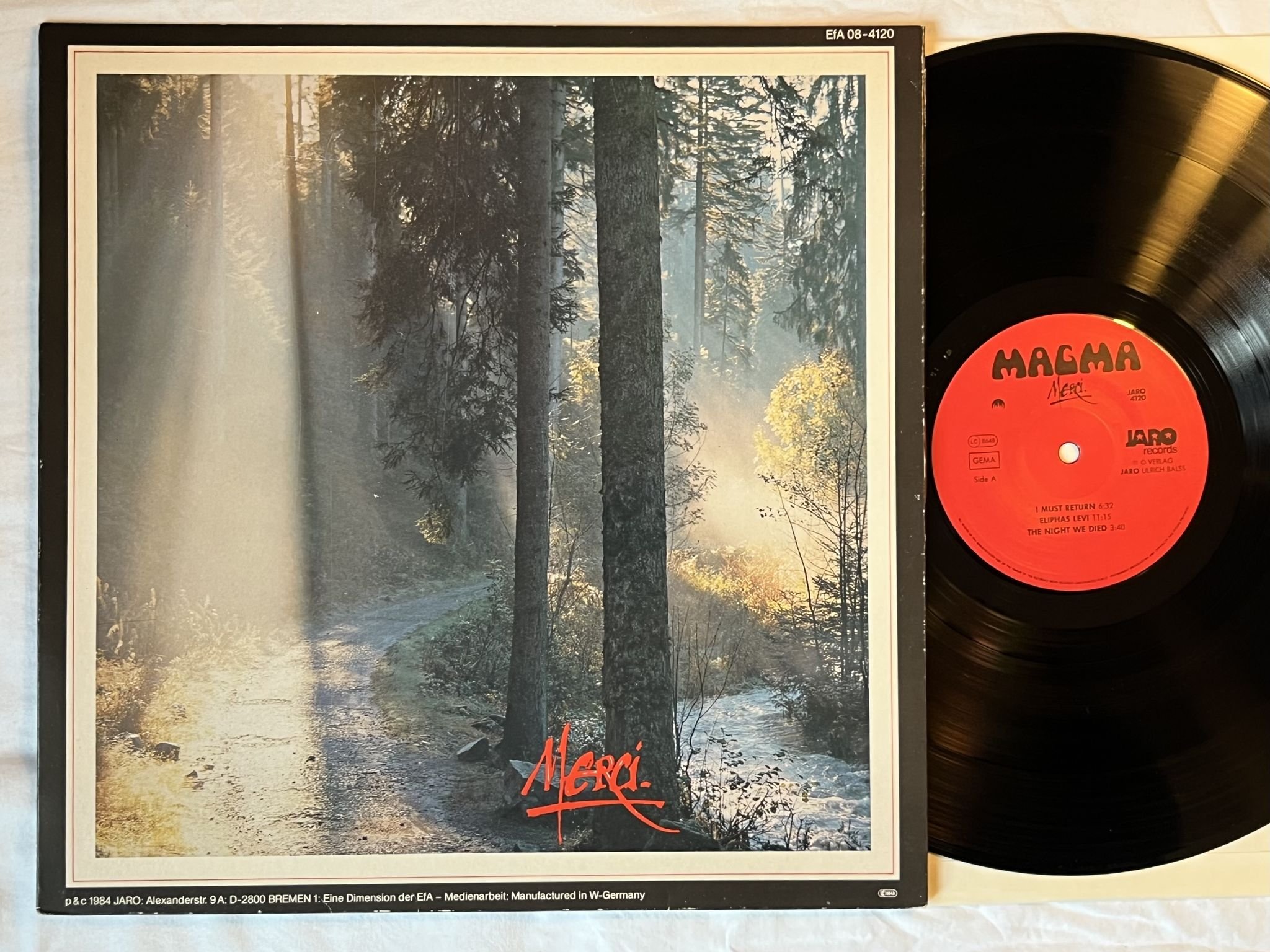 Omslagsbild för skivan MAGMA / Christian Vander - Merci LP -84 Ger JARO 4120 *** FULLY SIGNED ***