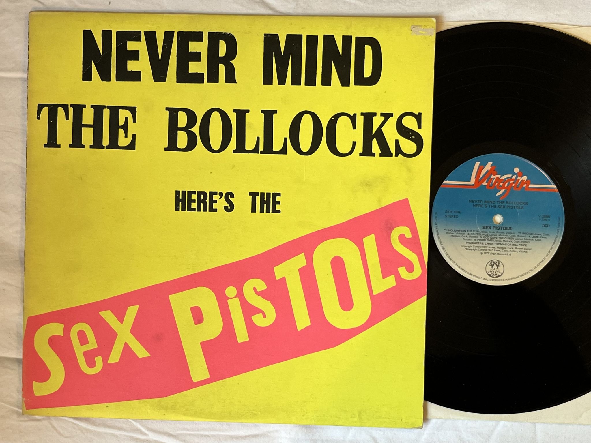Omslagsbild för skivan SEX PISTOLS Never Mind The Bollocks LP -77 ncb VIRGIN V 2086 *** BLANK BACK ***