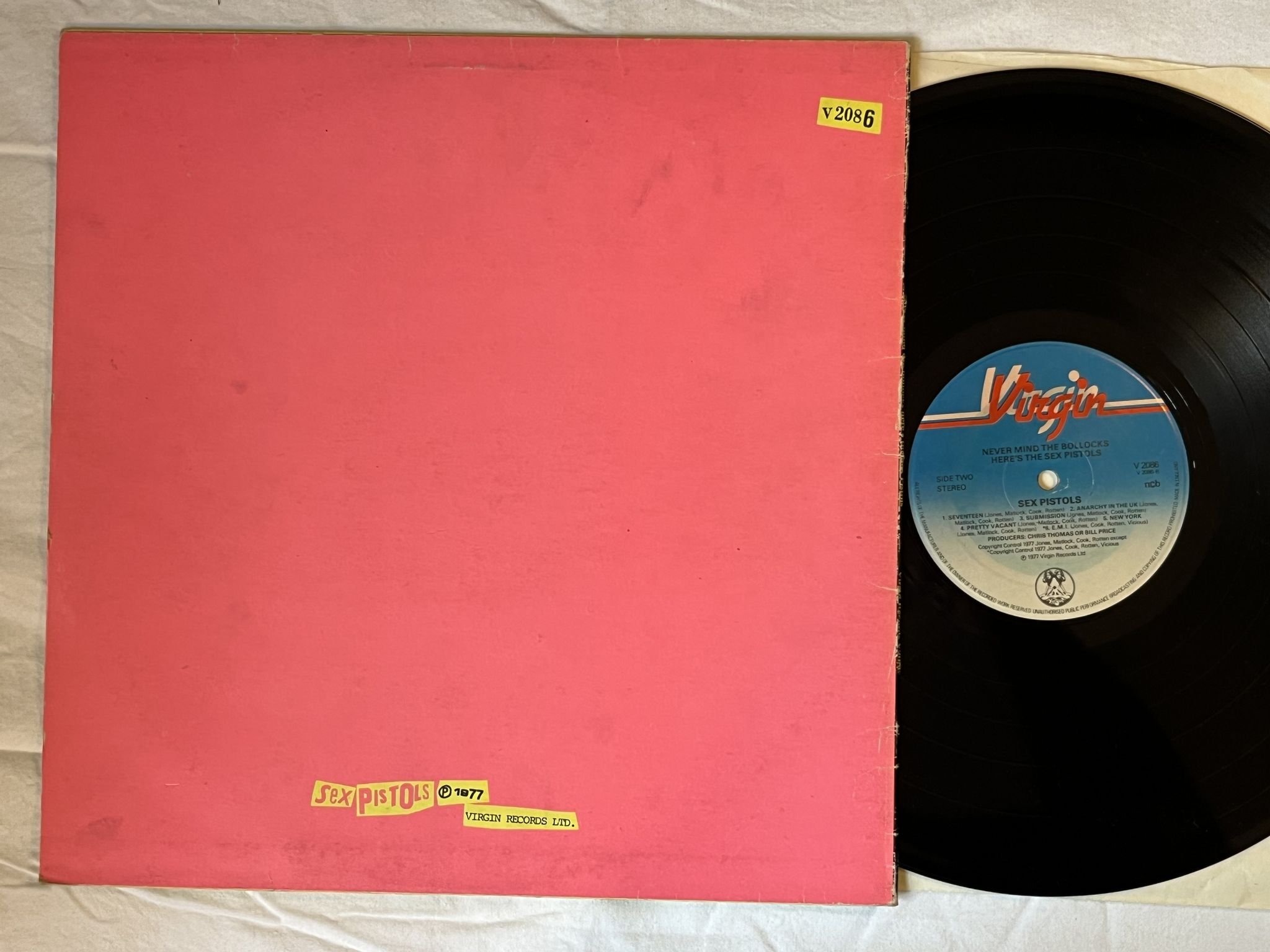 Omslagsbild för skivan SEX PISTOLS Never Mind The Bollocks LP -77 ncb VIRGIN V 2086 *** BLANK BACK ***