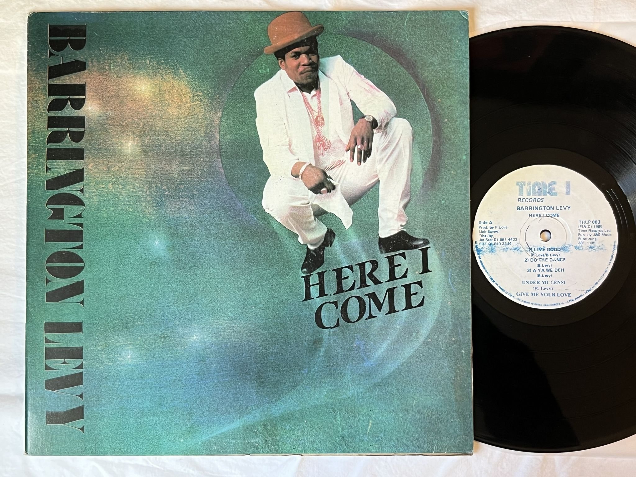 Omslagsbild för skivan BARRINGTON LEVY Here I Come LP -85 JAMAICA TIME 1 TRLP 003
