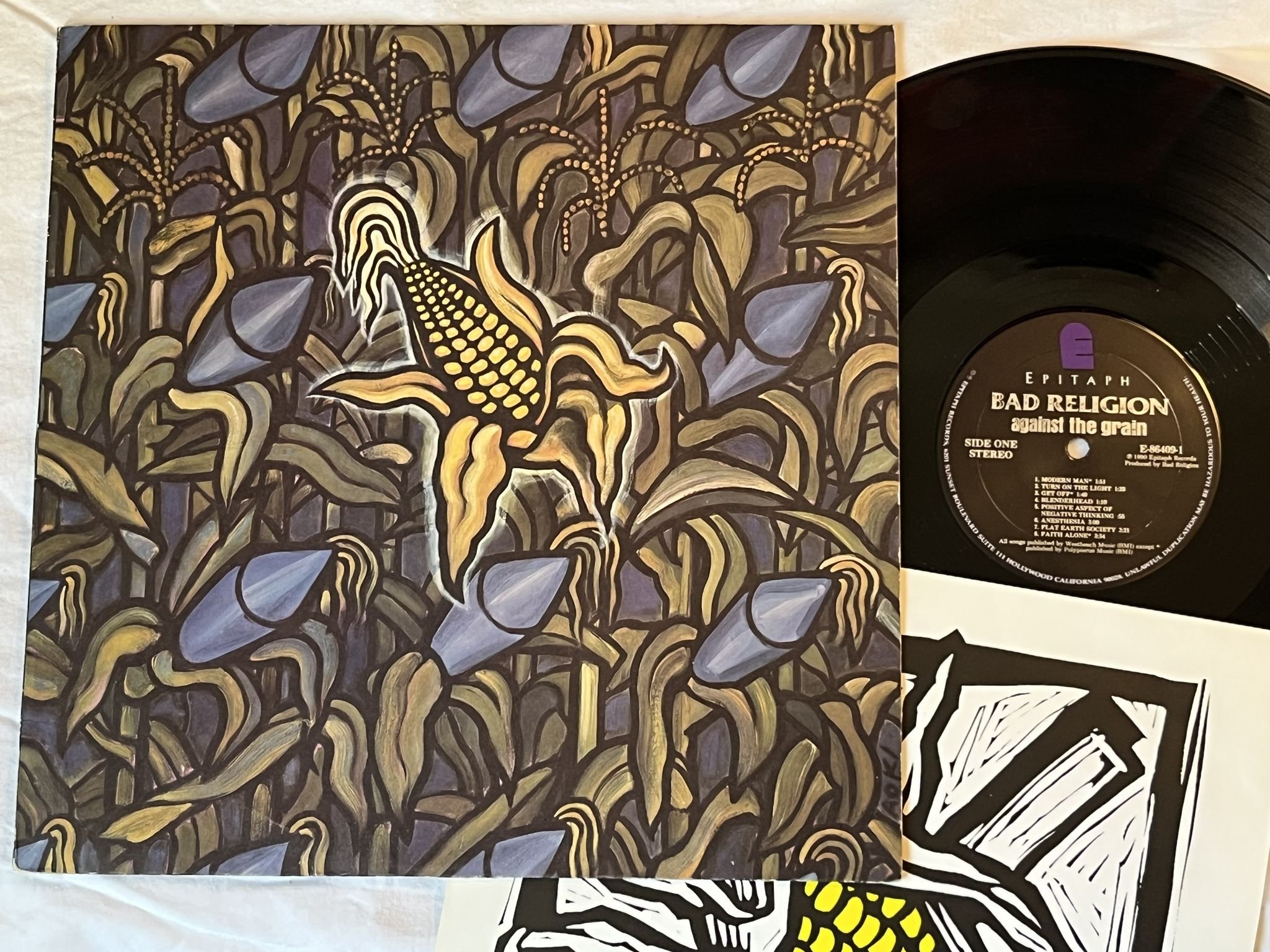 Omslagsbild för skivan BAD RELIGION against the drain LP -90 US EPITAPH E-86409-1