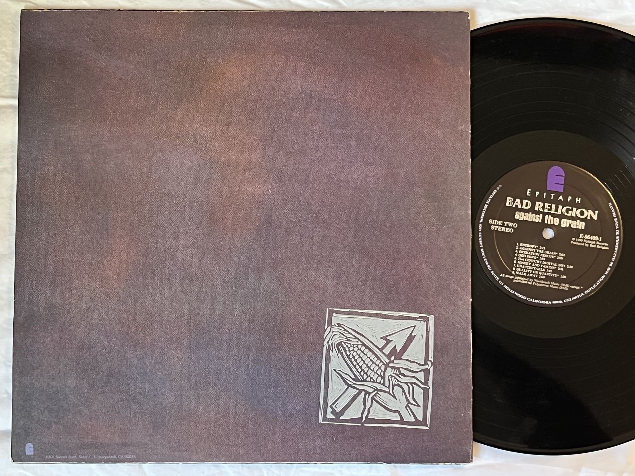 Omslagsbild för skivan BAD RELIGION against the drain LP -90 US EPITAPH E-86409-1