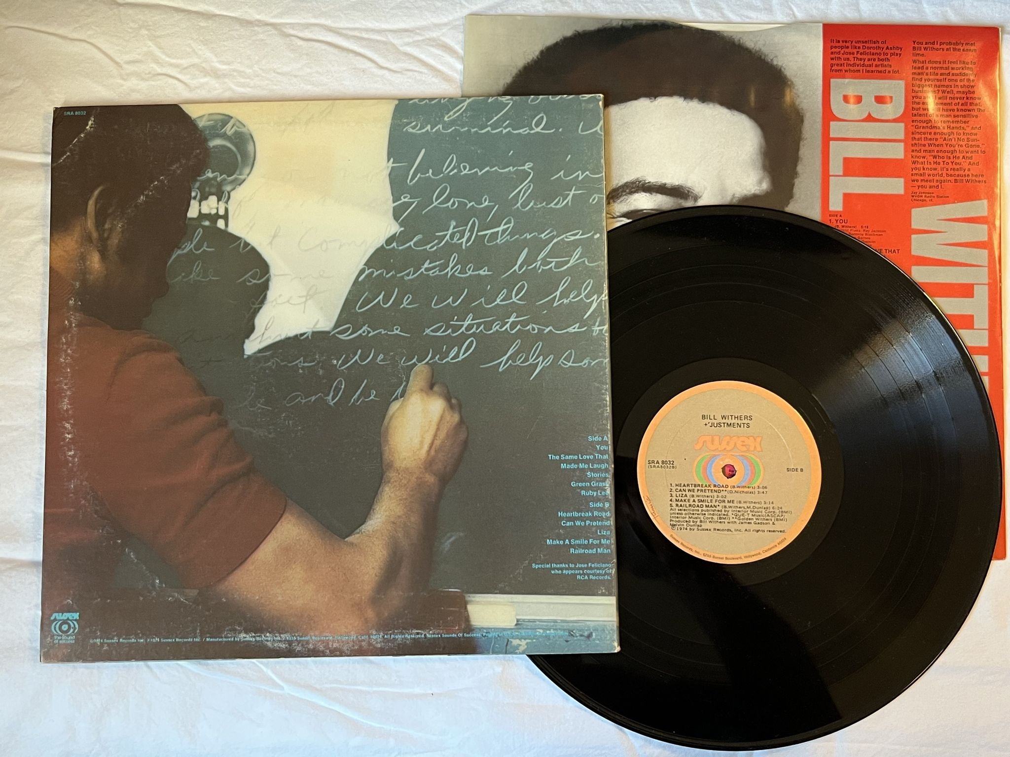 Omslagsbild för skivan BILL WITHERS +justments LP -74 US SUSSEX SRA 8032