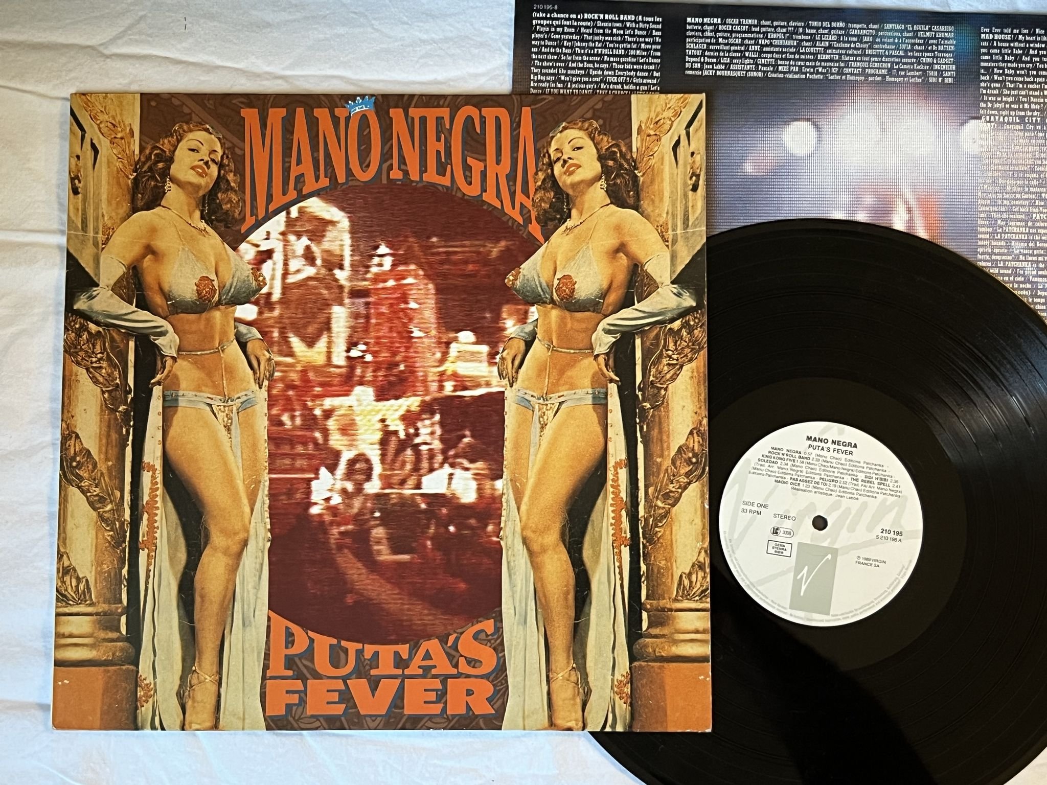 Omslagsbild för skivan MANO NEGRA puta's fever LP -89 VIRGIN 210195