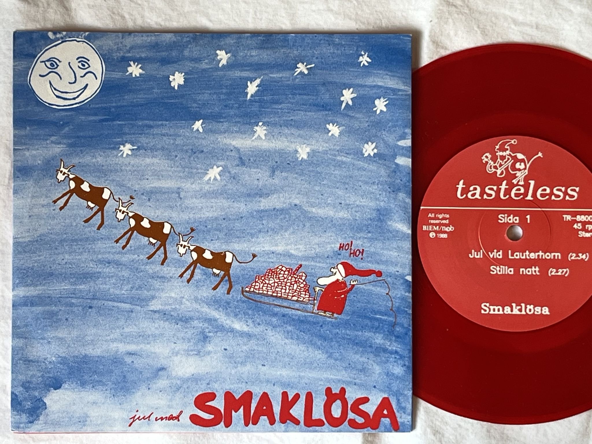 Omslagsbild för skivan SMAKLÖSA Jul Med Smaklösa 7"EP -88 TASTELESS TR-88008 ** RED VINYL **