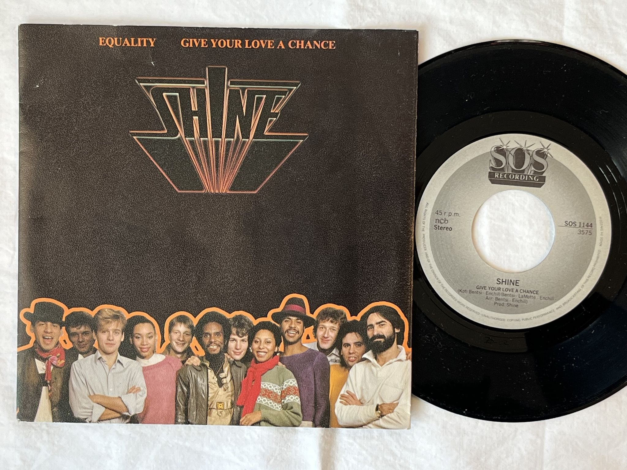 Omslagsbild för skivan SHINE give your love a chance 7" -83 SOS 1144 ** Superb Swedish Boogie **