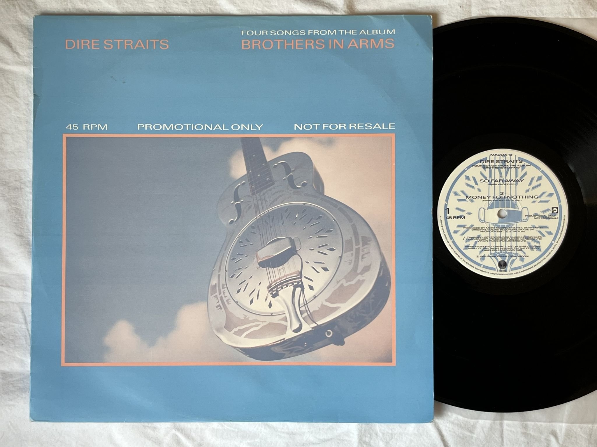 Omslagsbild för skivan DIRE STRAITS four songs from the brothers in arms 12"single -85 promo MADOX 13