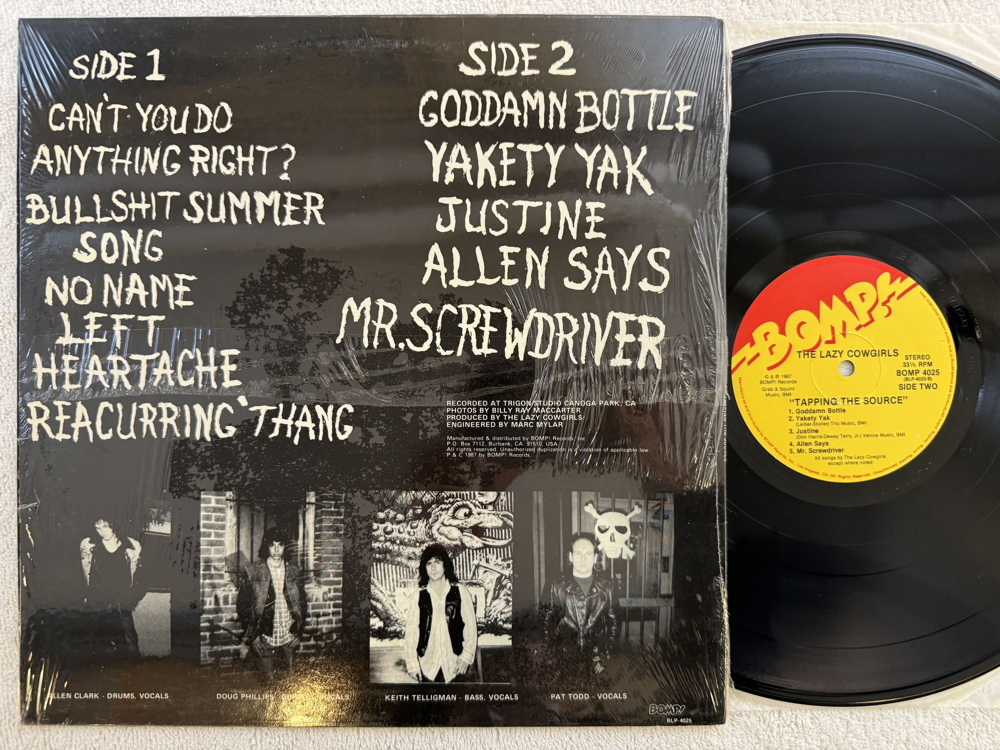 Omslagsbild för skivan THE LAZY COWGIRLS Tapping The Source LP -87 US BOMP! BOMP 4025