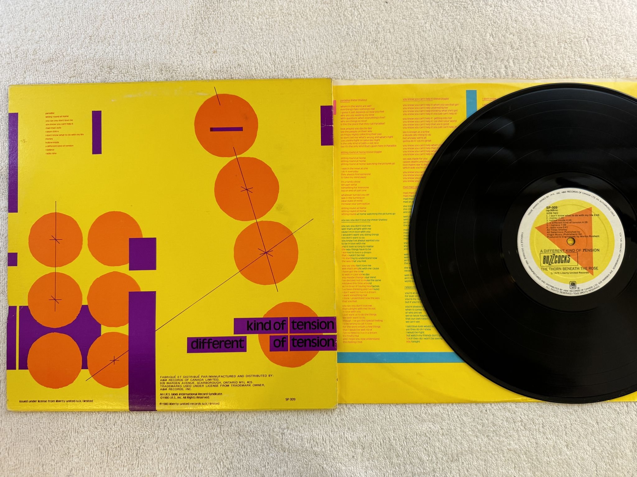 Omslagsbild för skivan BUZZCOCKS a different kind of tension LP -80 Can A&M SP-009